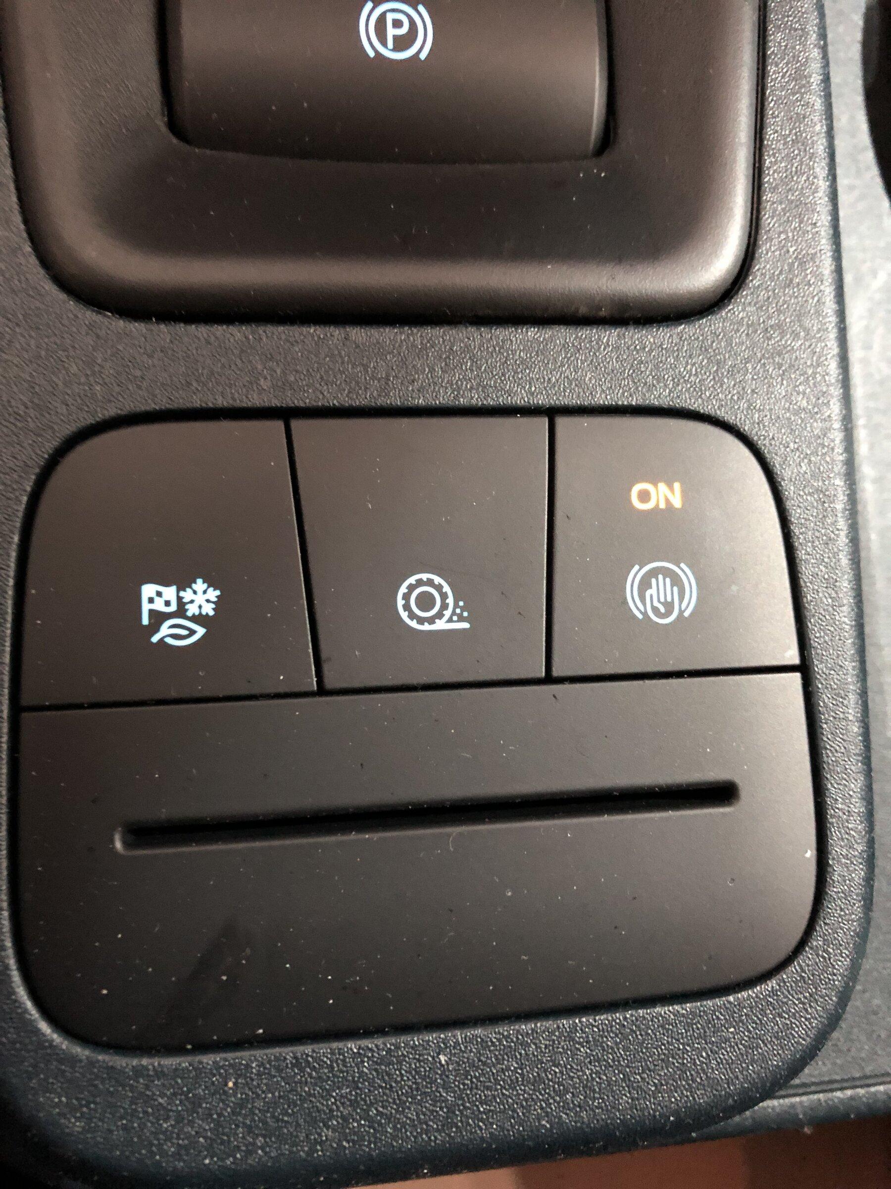 Ford Maverick Wondering What This Button Was On Lariat IMG_1989.JPG