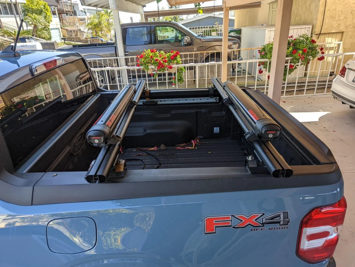 Ford Maverick Installed Medium Profile cross bars with Ford Accessories hard rollup PXL_20220329_213719365