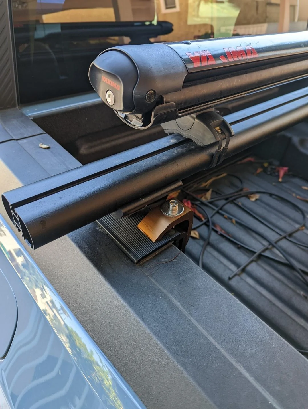 Ford Maverick Installed Medium Profile cross bars with Ford Accessories hard rollup PXL_20220329_213725535