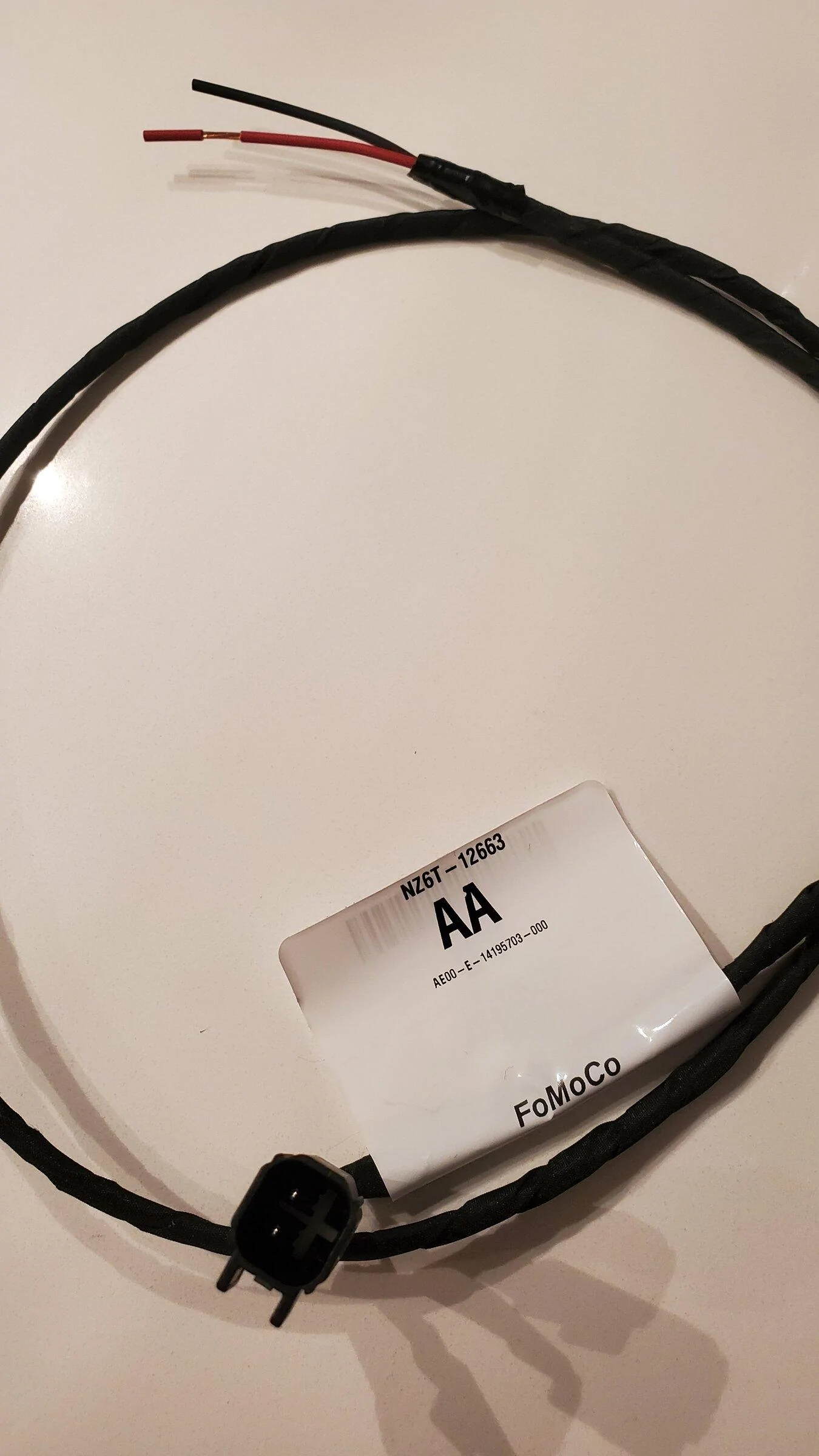 Ford Maverick Unknown part # NZ6T-12663 cable left in XL glove box? What is it used for? 20220401_200540