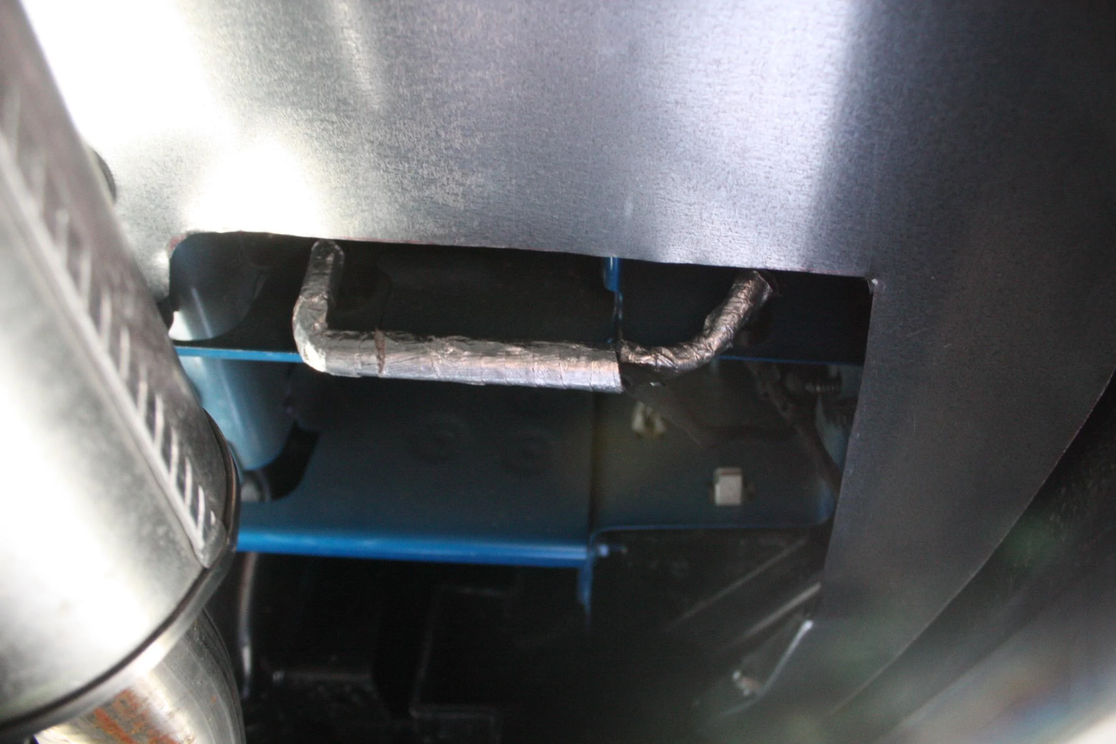 Ford Maverick Custom fabricated cover / filler panel for left rear underbody opening IMG_2409