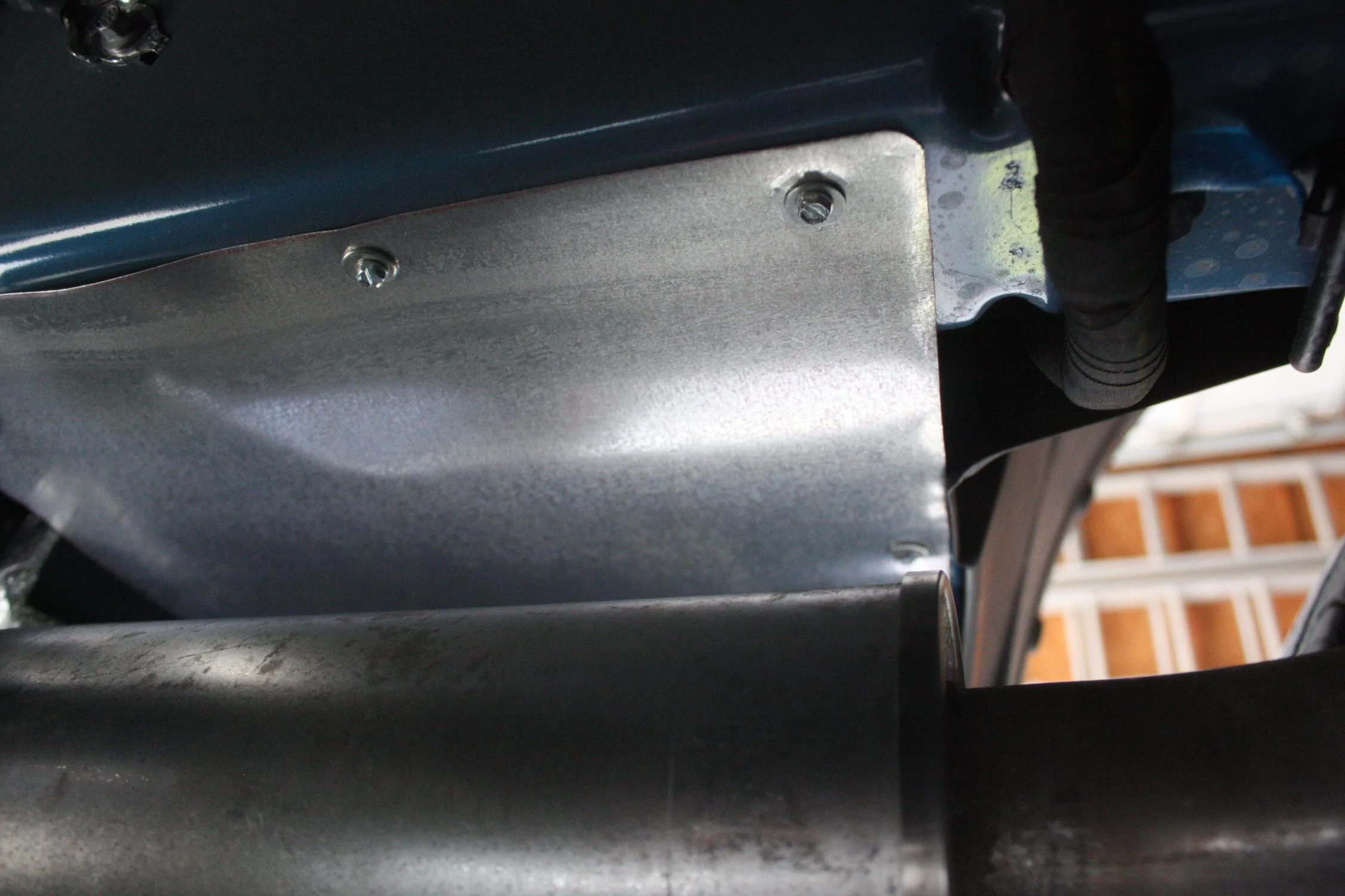 Ford Maverick Custom fabricated cover / filler panel for left rear underbody opening IMG_2411