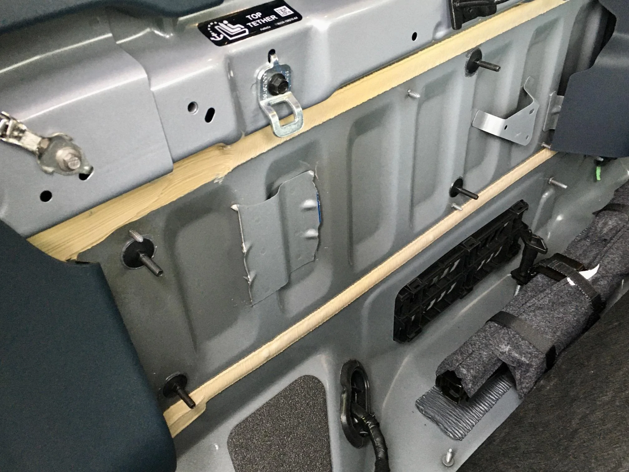 Ford Maverick Another method to mount Kicker Hideaway / amp board to back cabin wall Bolts Installed