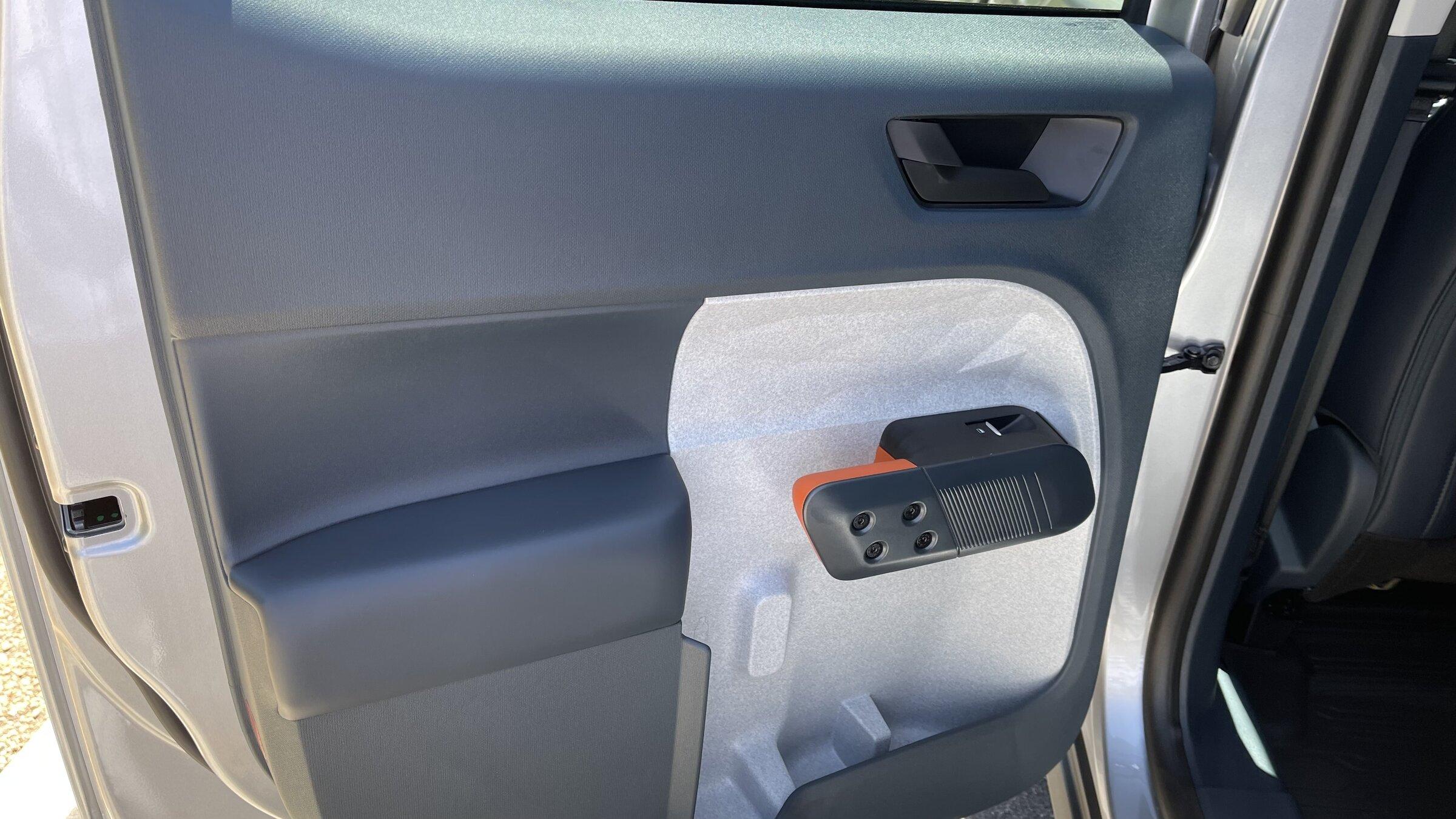 Ford Maverick Received my Maverick today - wrong door panel/handle (not complaining!) Better Pics Driver Side Rear Far XLT