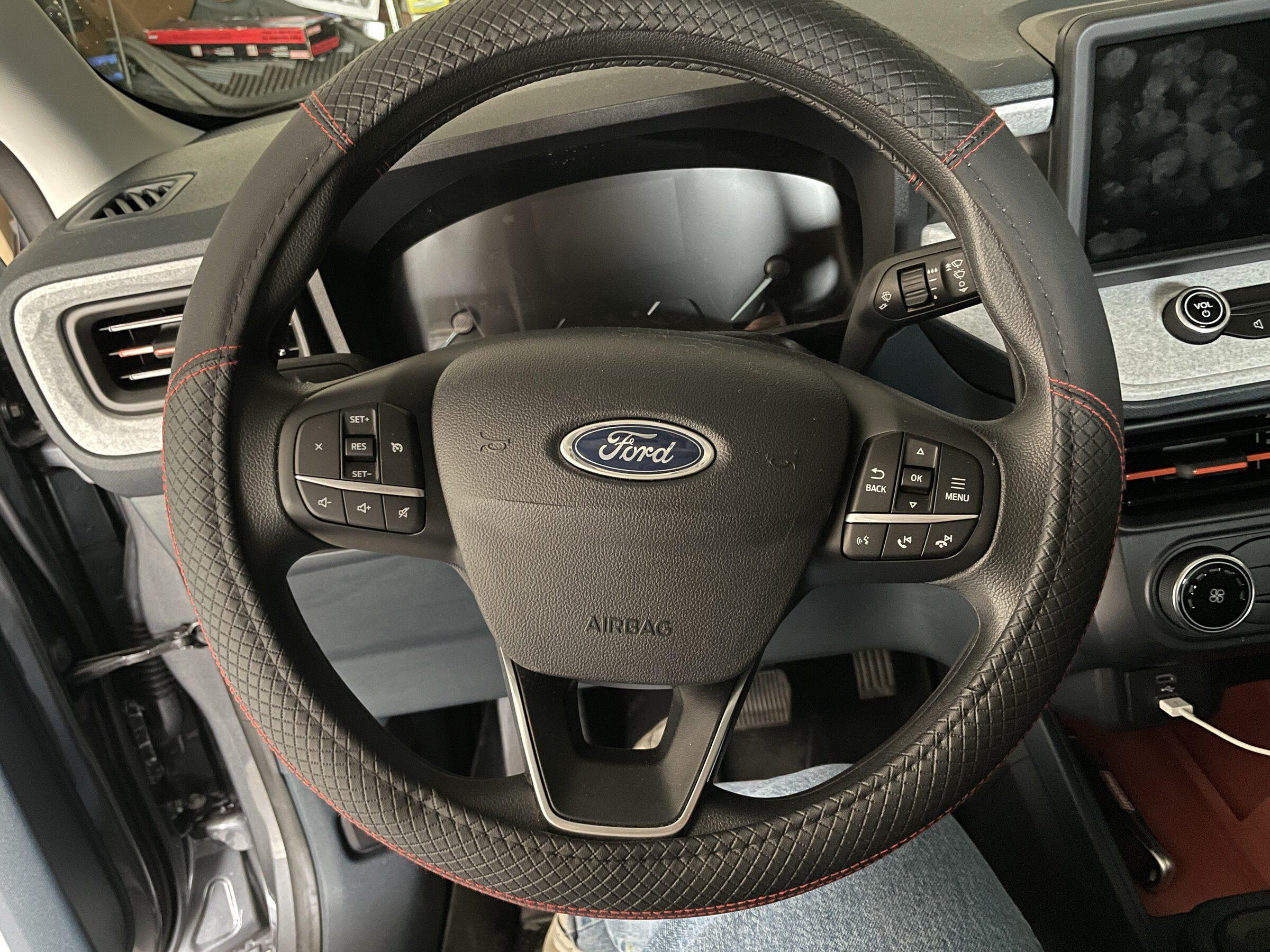 Ford Maverick Orange accented steering wheel cover for XLT interior IMG_5074.JPG