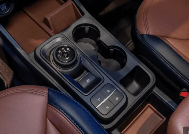 Ford Maverick What'd you put in dash Cubby Hole (space next display screen)? 1630012514065