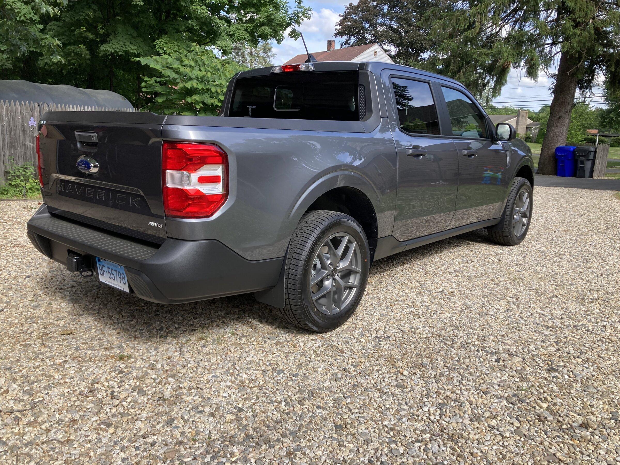 Ford Maverick Etrailer.com 9x15 Mud flaps installed IMG_0152.JPG