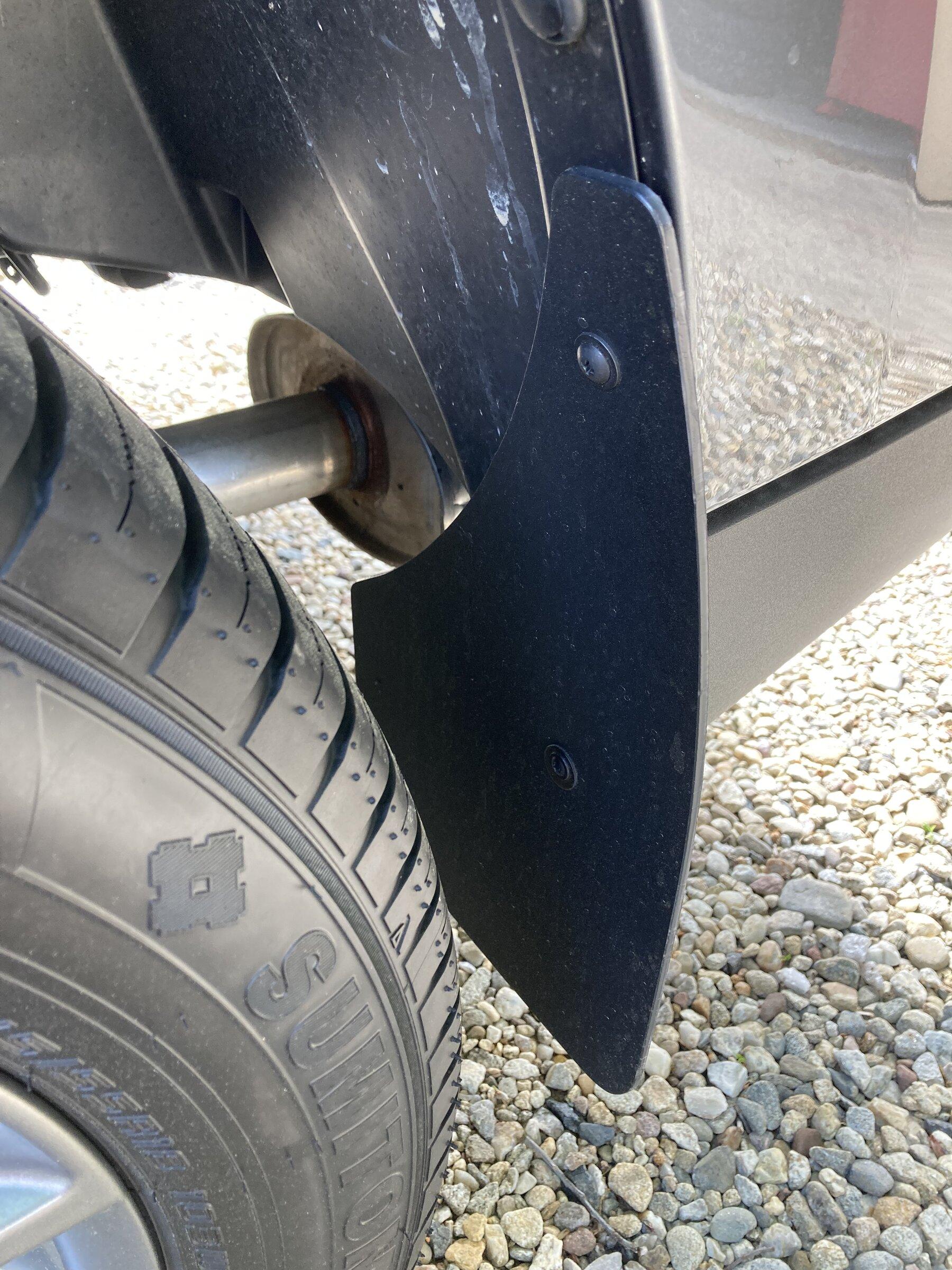 Ford Maverick Etrailer.com 9x15 Mud flaps installed IMG_0155.JPG