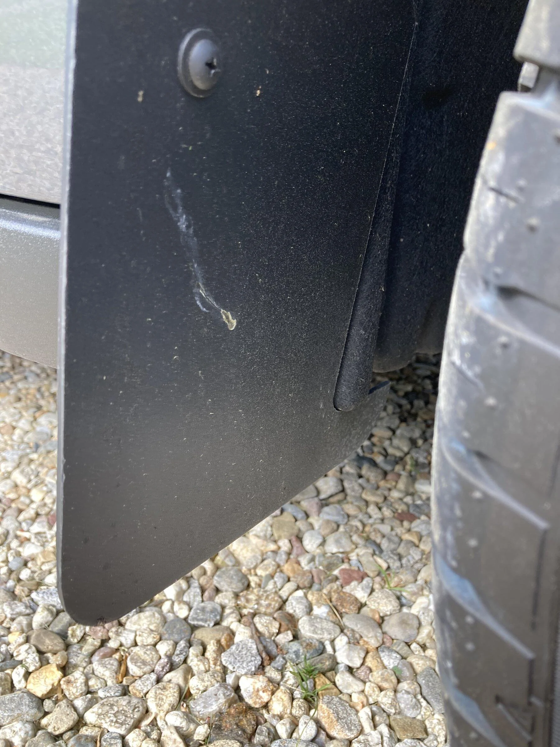 Ford Maverick Etrailer.com 9x15 Mud flaps installed IMG_0158