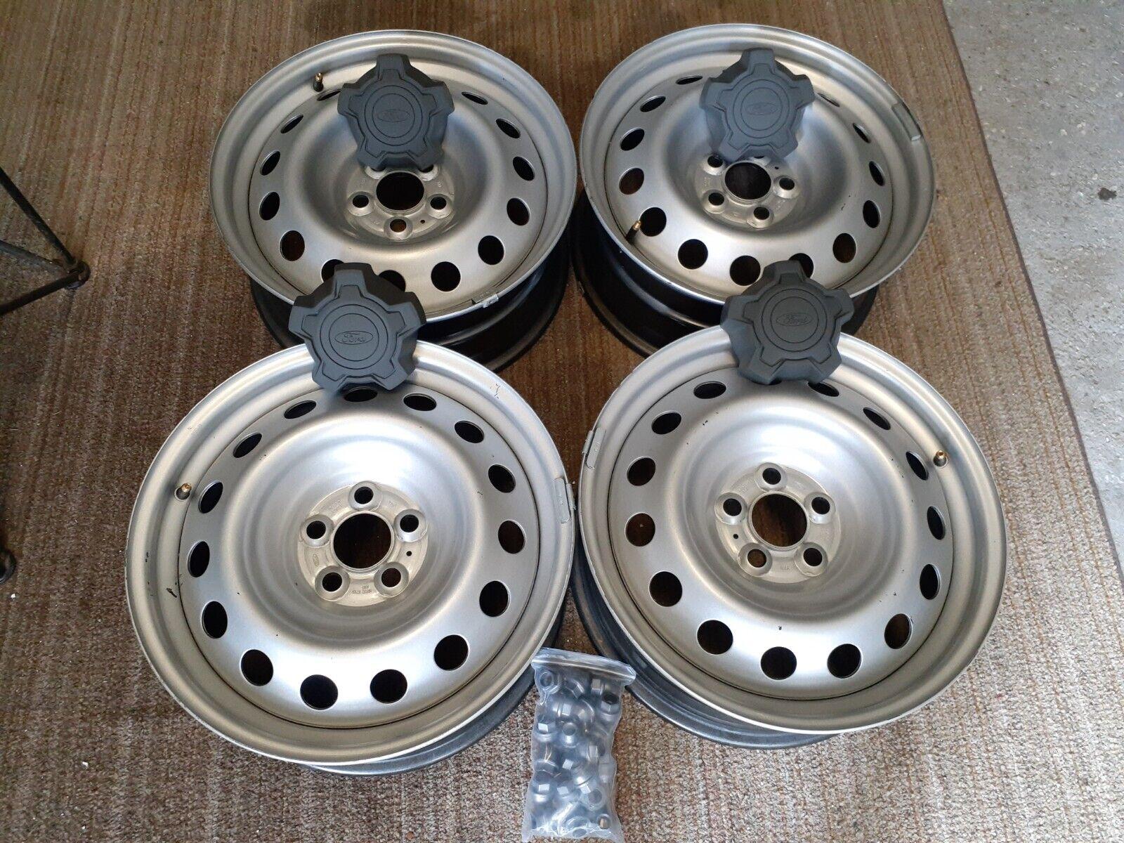 Ford Maverick Slamologist slammed Area51 (lowered on Escape springs) steel wheels with centercaps
