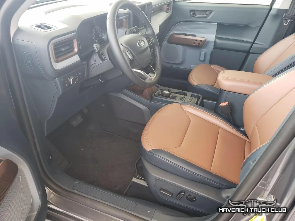 Ford Maverick Hybrid Maverick showing 37.4 MPG + rear seats folded w/ headrests removed (pics) Hybrid Maverick Lariat Carbonized Gray 8