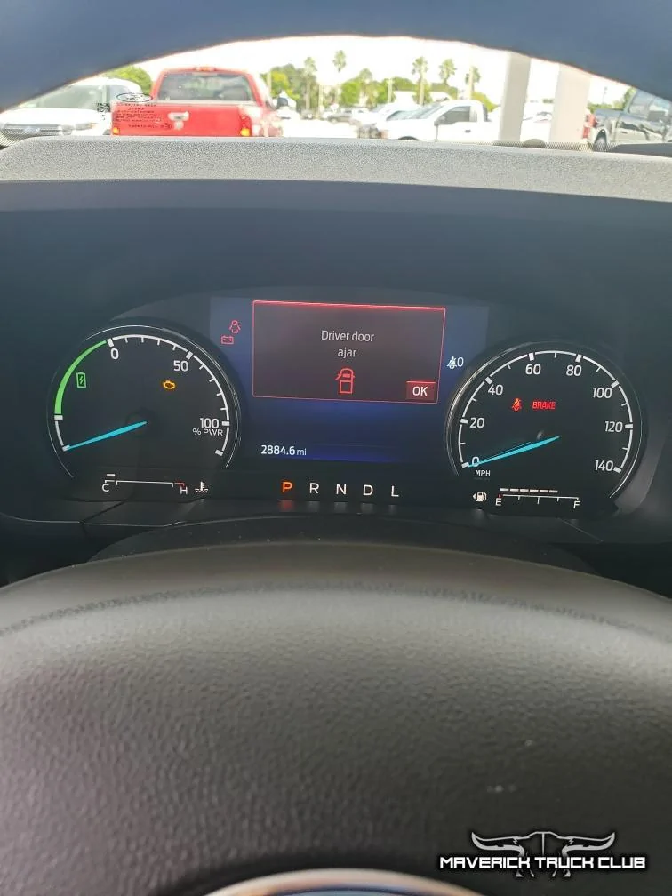 Ford Maverick Hybrid Maverick showing 37.4 MPG + rear seats folded w/ headrests removed (pics) Hybrid Maverick Lariat Carbonized Gray 2