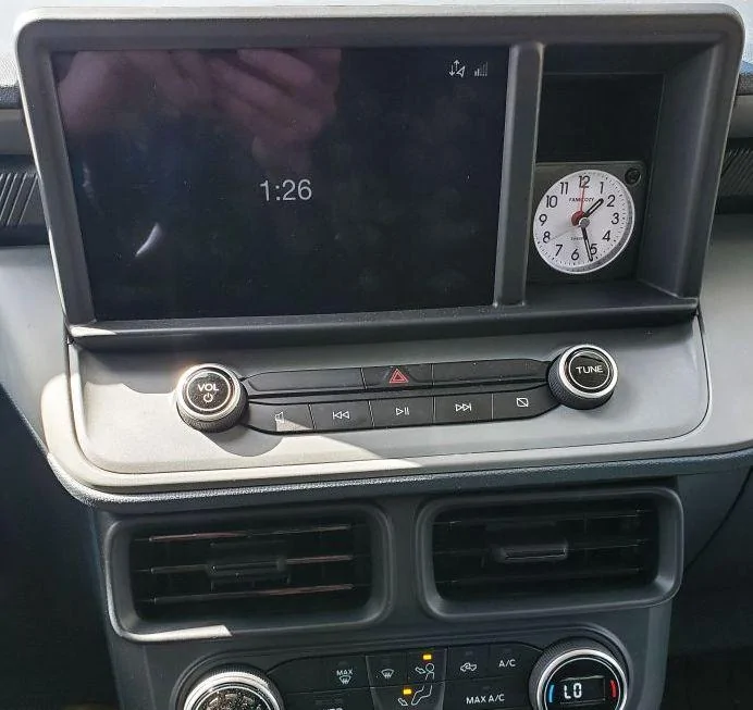 Ford Maverick Cubby hole clock. clock