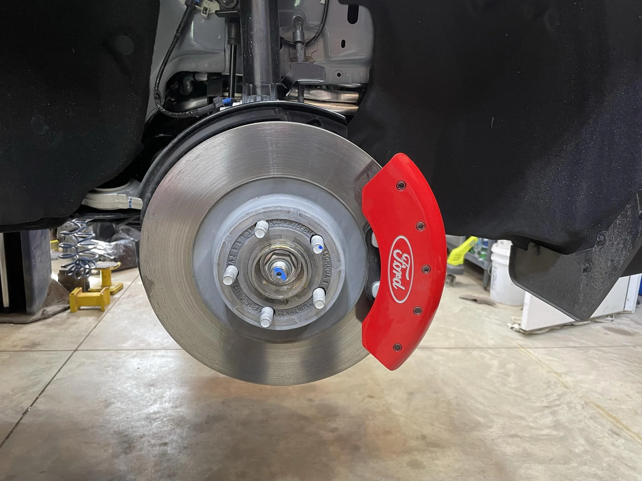 Ford Maverick Brake caliper covers from MGP Calipers installed EFD0A457-9B08-4D28-B2C2-73780C50D8C3