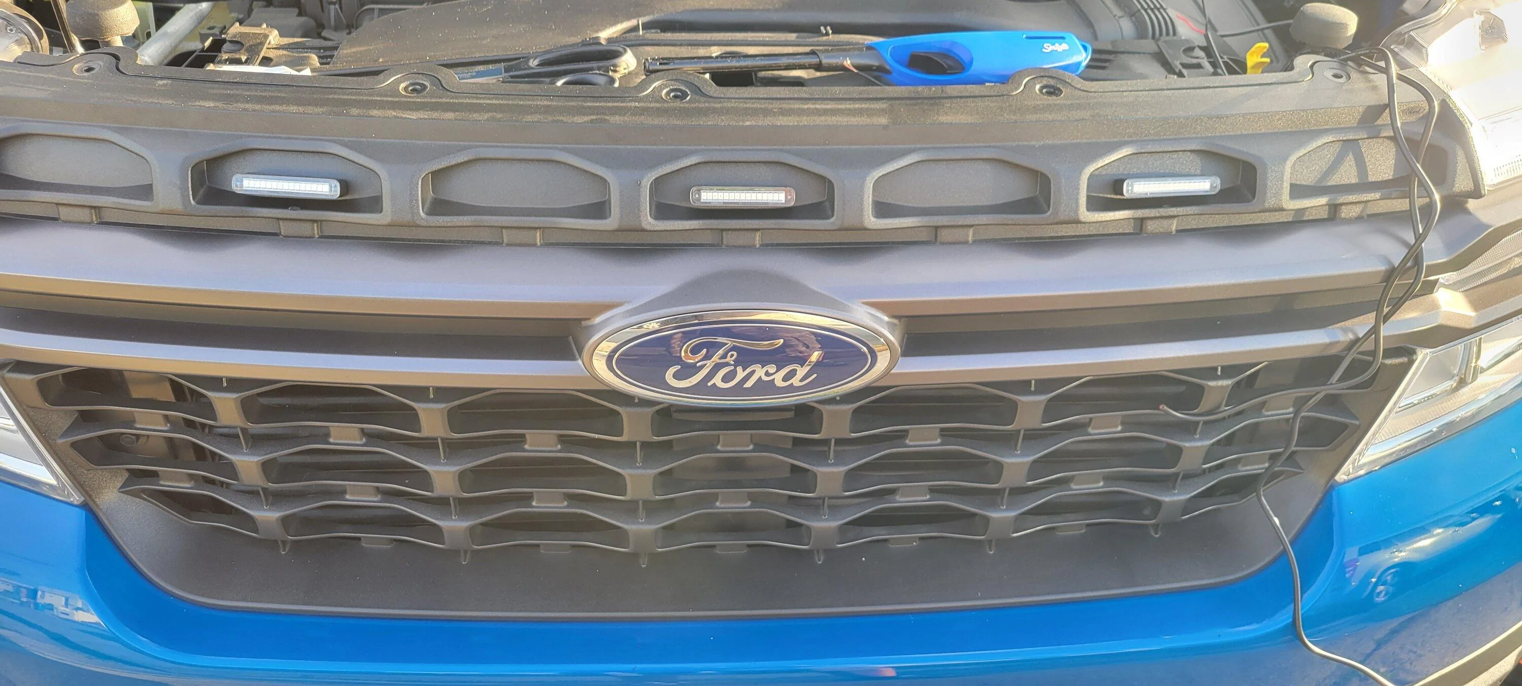 Ford Maverick My new Raptor 3-Light LED Grill Lights installed! 20221016_170845