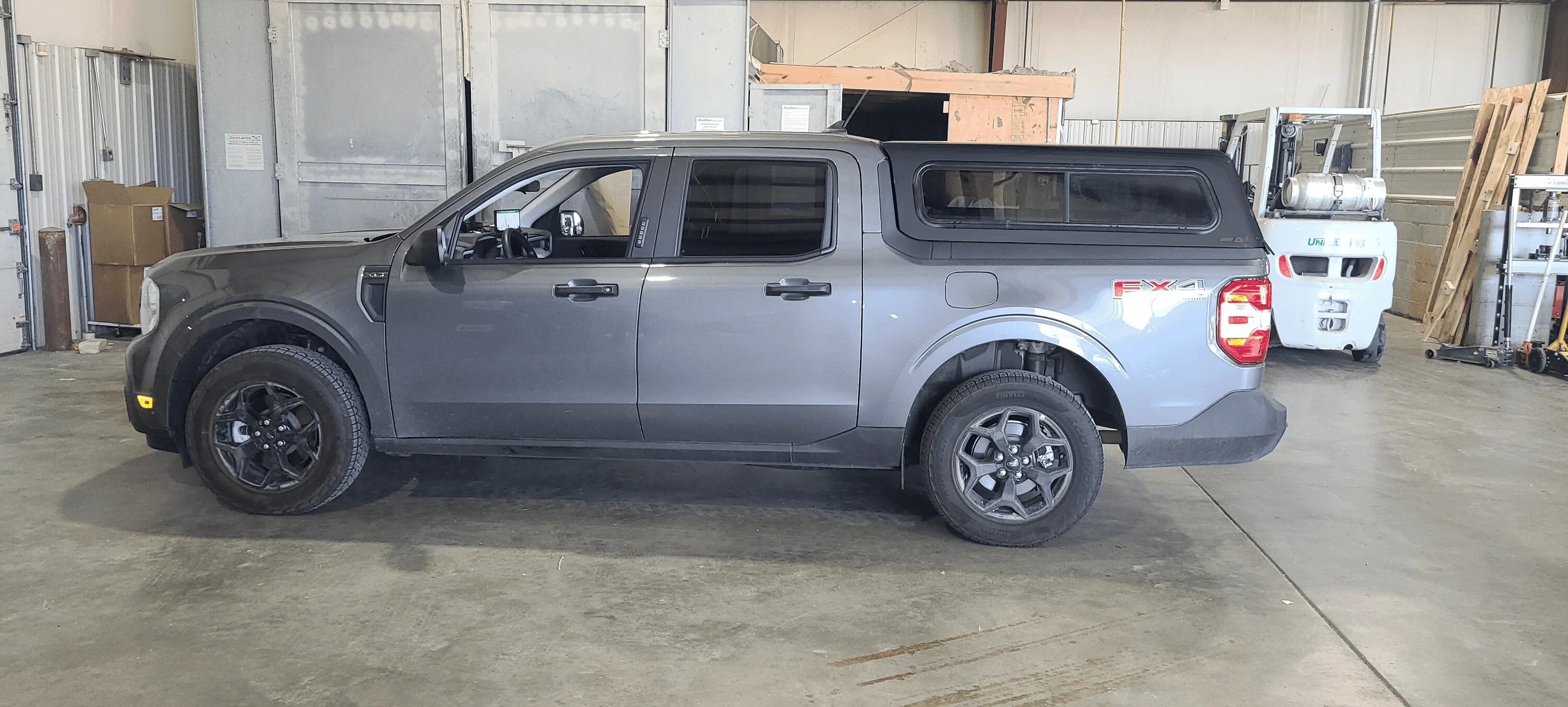Ford Maverick ARE V bed cap shell installed on Maverick XLT Black bed ca