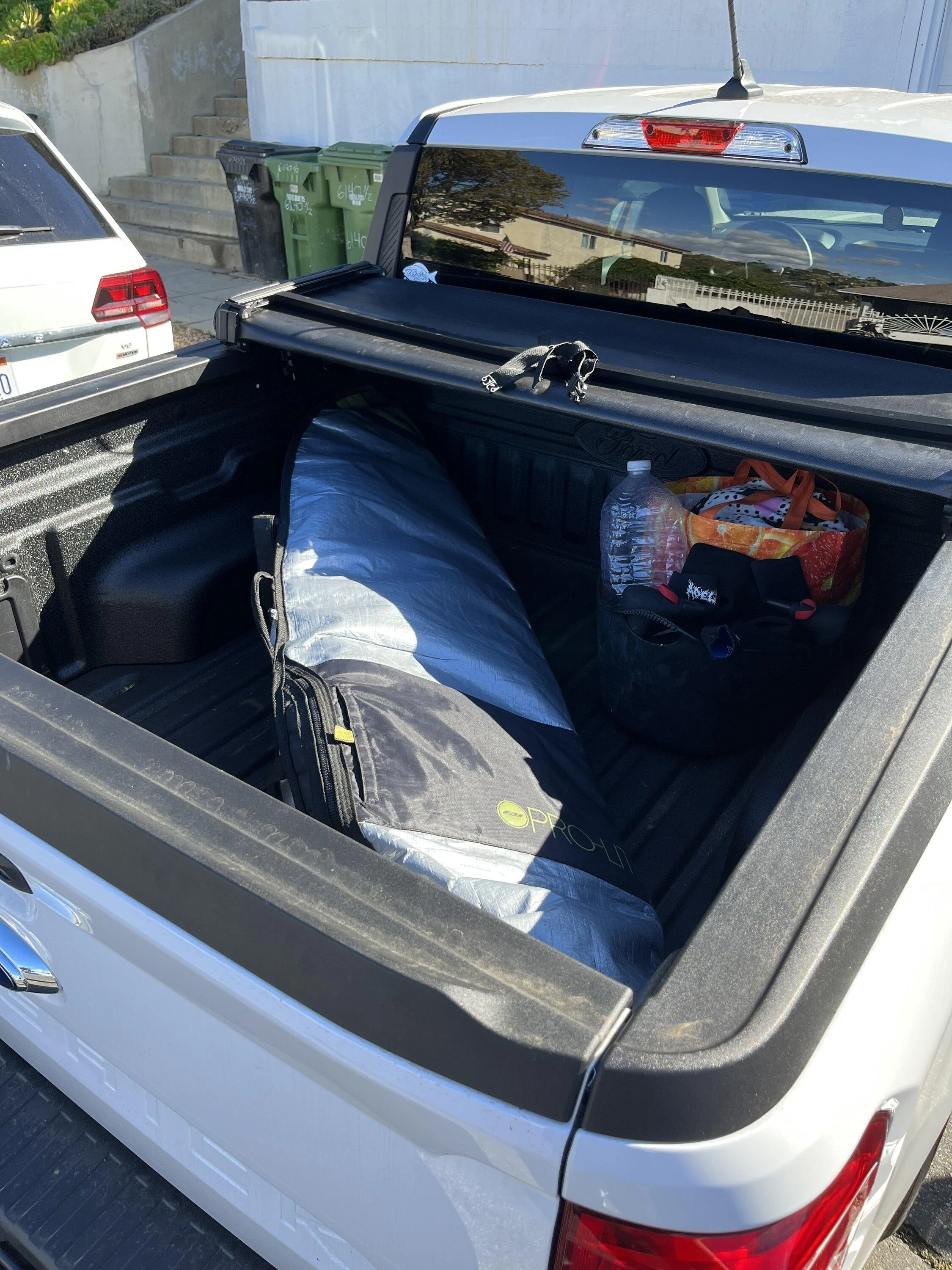 Ford Maverick 6'0" surfboard fits in the bed diagonal 224AD14F-1956-45EF-951E-E3D7244FC26E