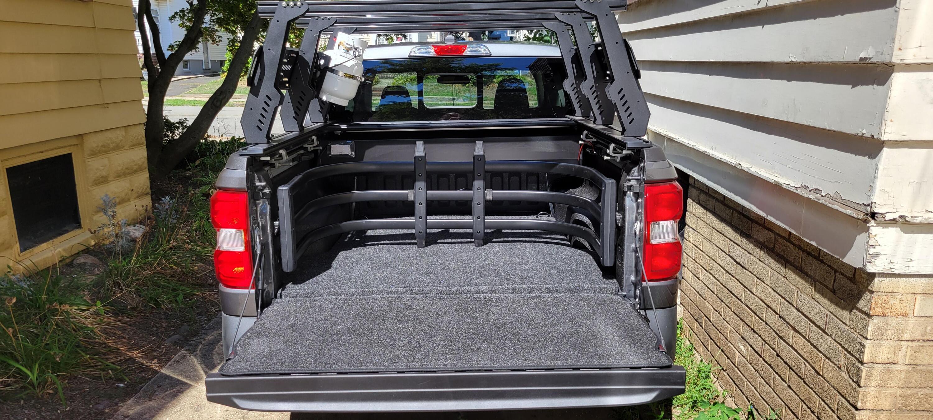 Ford Maverick Driver's side bed cubby with AC outlet on the inside dXdpma