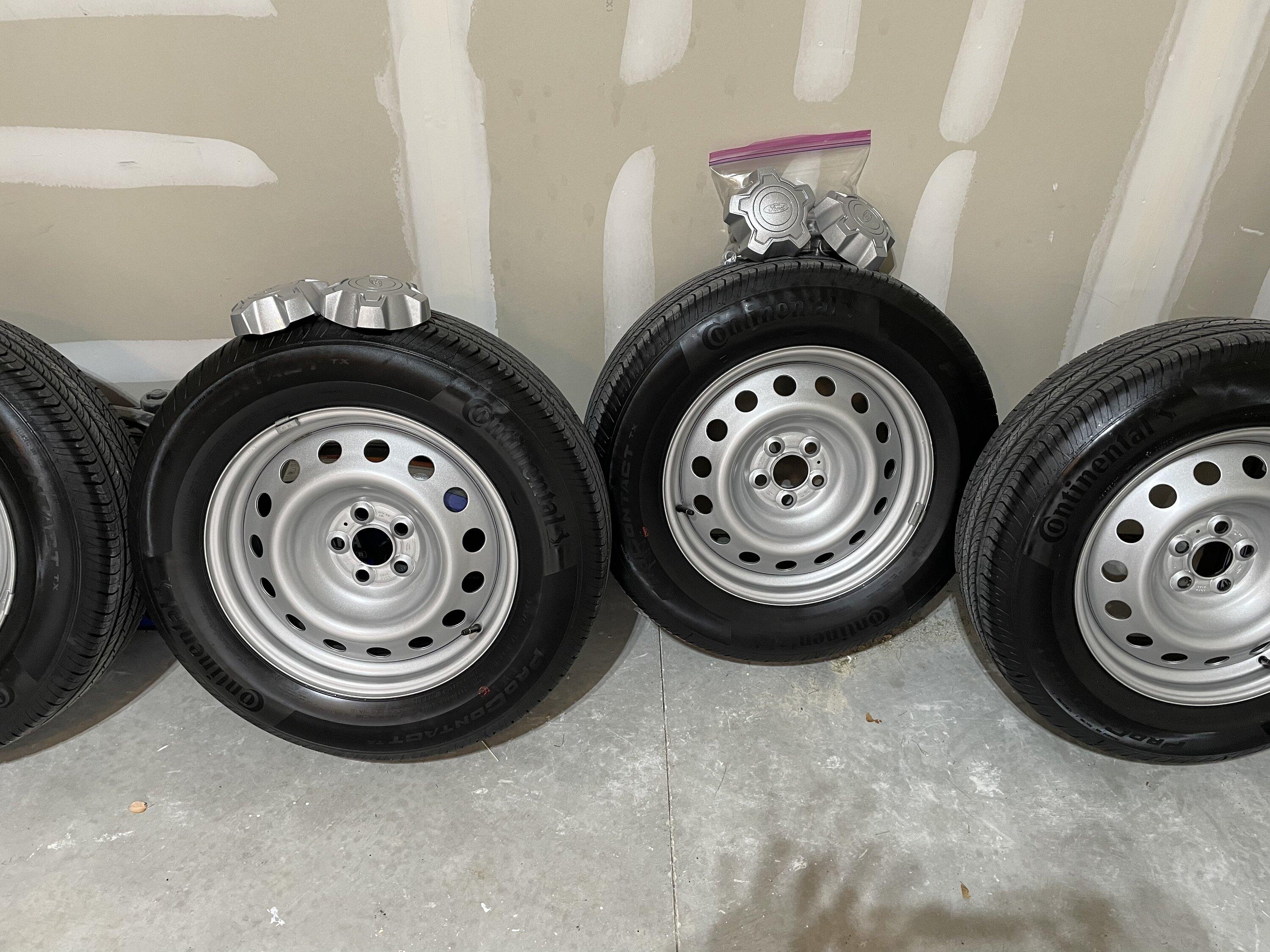Ford Maverick Steelies with tires TPMs  nuts locks n center caps 97805262-9C78-473E-B863-41BB0D5C68C2