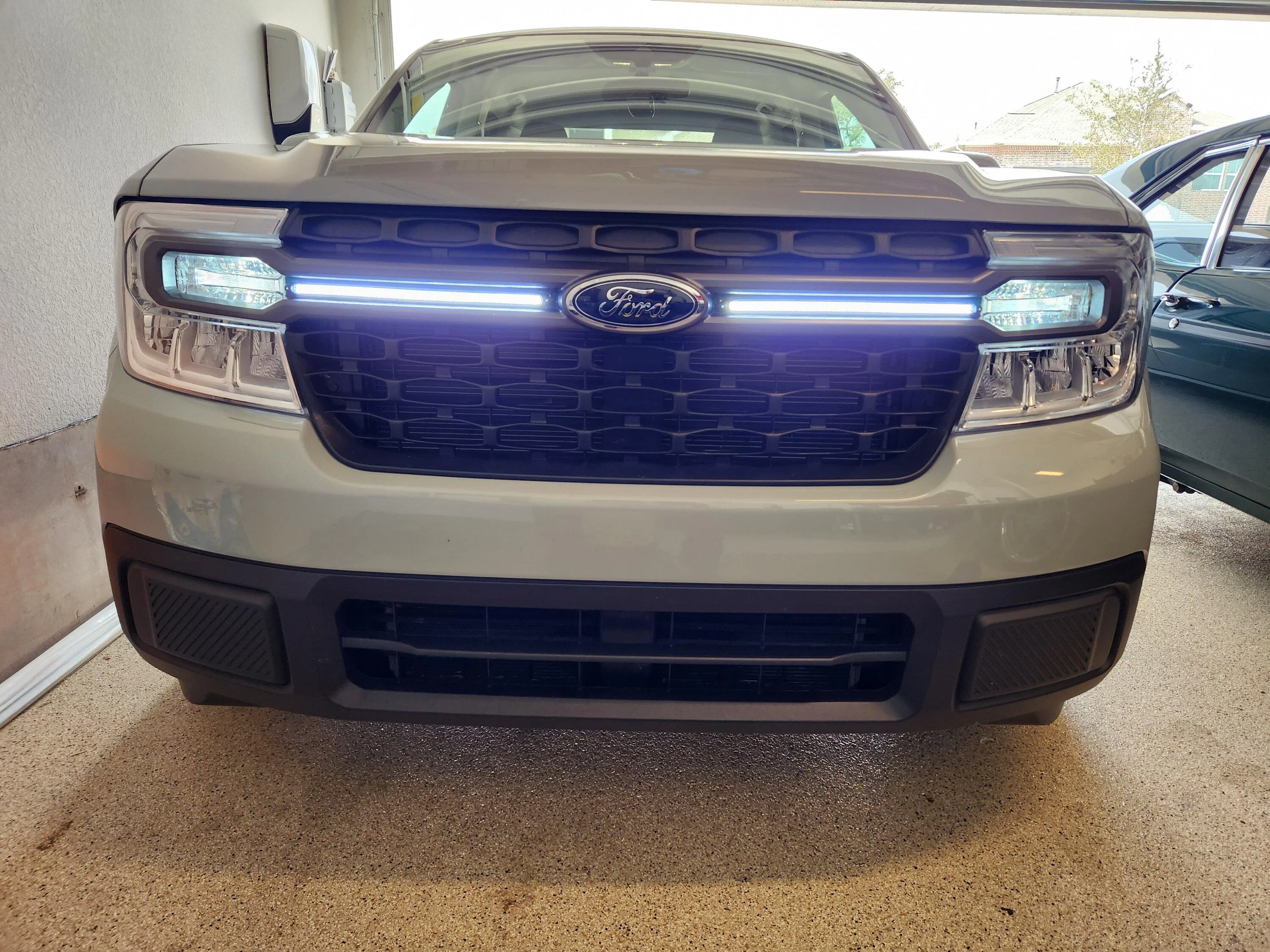 Ford Maverick Installed new DRLs on my Maverick XLT = added strip lights to front grill 20230106_115055