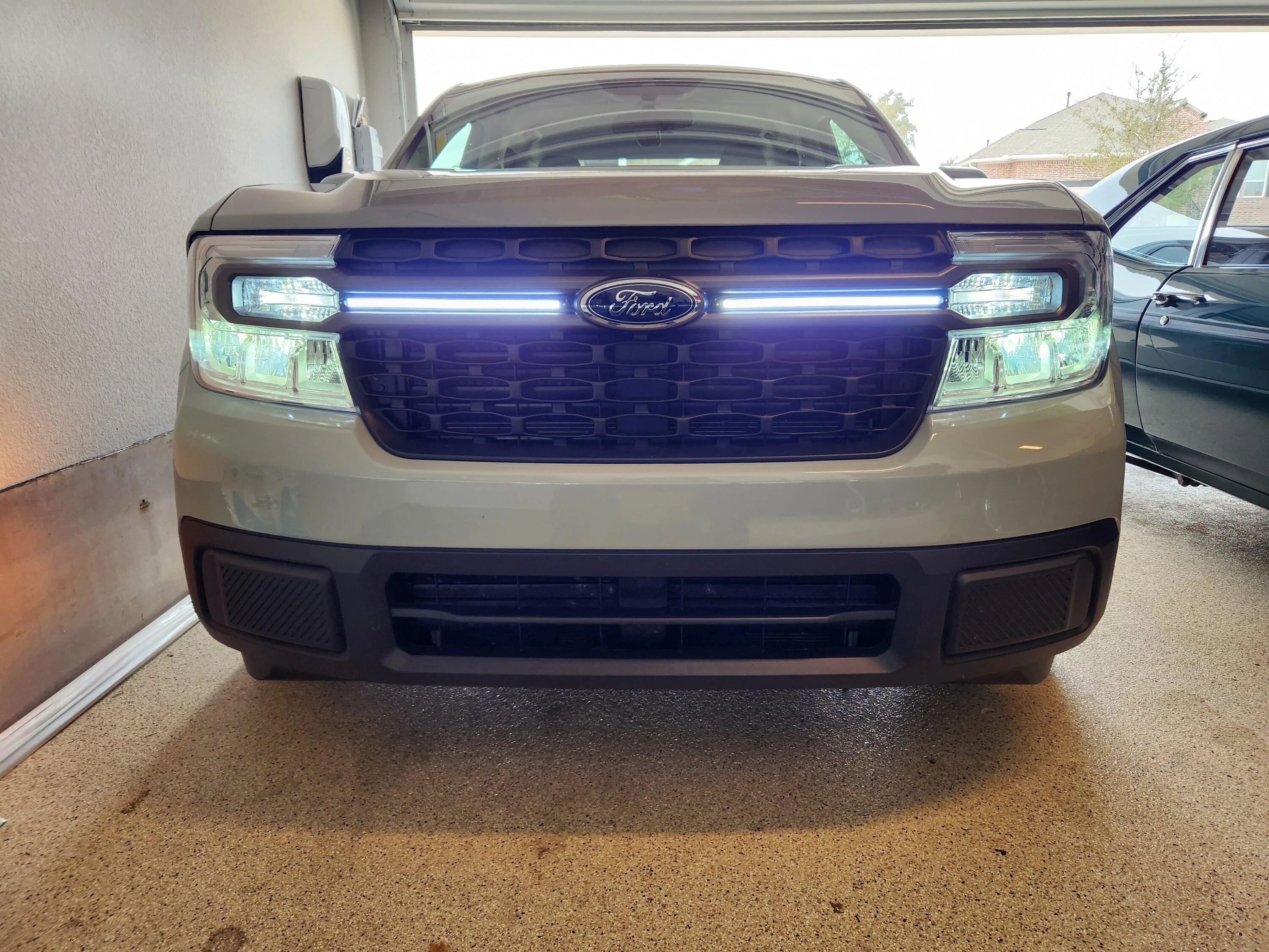 Ford Maverick Installed new DRLs on my Maverick XLT = added strip lights to front grill 20230106_115124