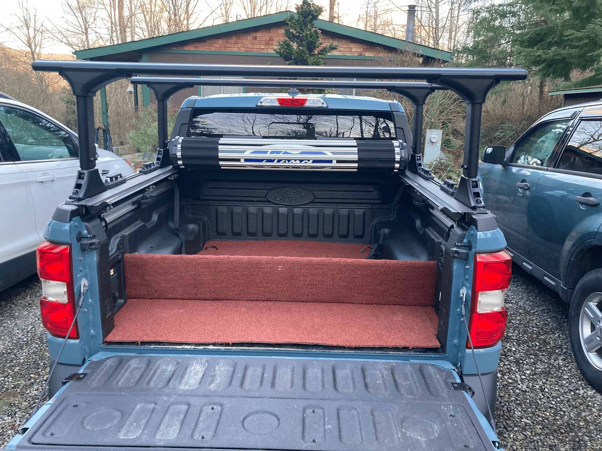 Ford Maverick Installed Elevate Racks, Ford Hard Roll-up Tonneau and Boeing airplane carpet rug 1676080929693