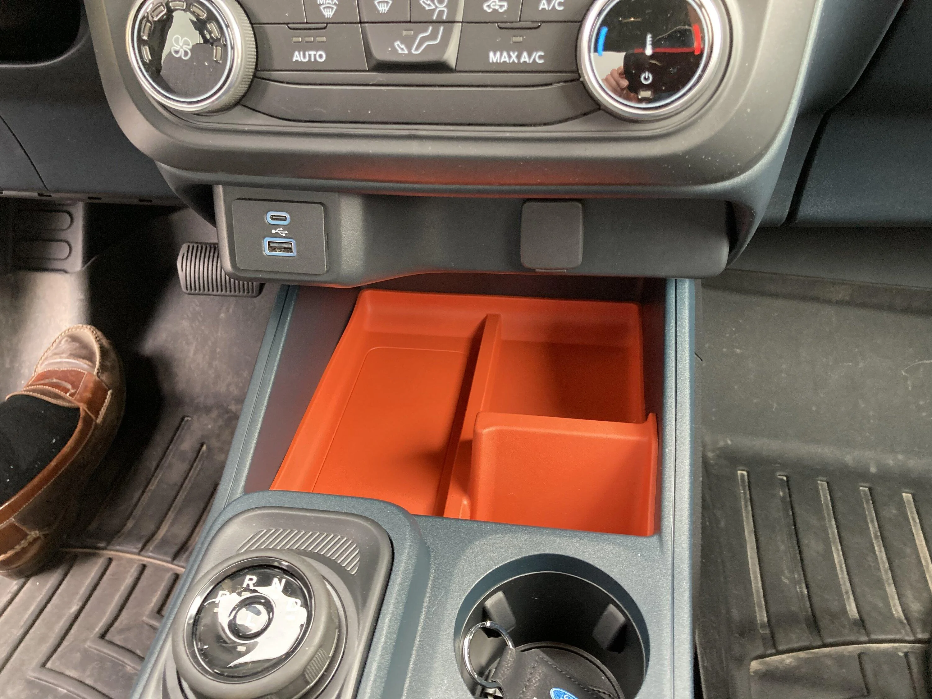 Ford Maverick Orange center console tray liner - standard or optional equipment? 2DE7EBB5-5401-4960-B66F-A805E949BEB4