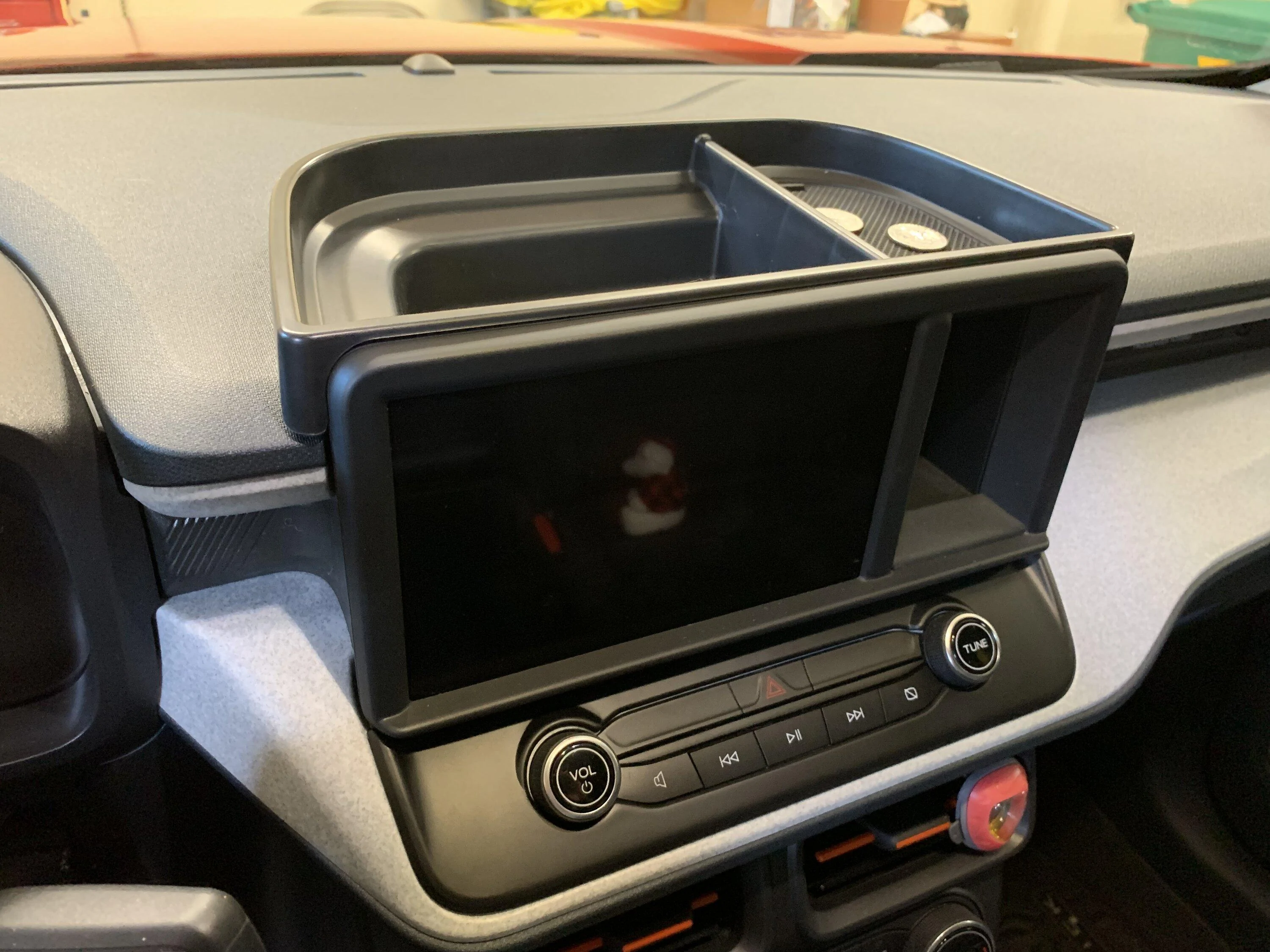 Ford Maverick Audio black trim panel with Muslogy dash tray combination installed 610DC520-C75A-4C65-954F-8F3DFF1682FA