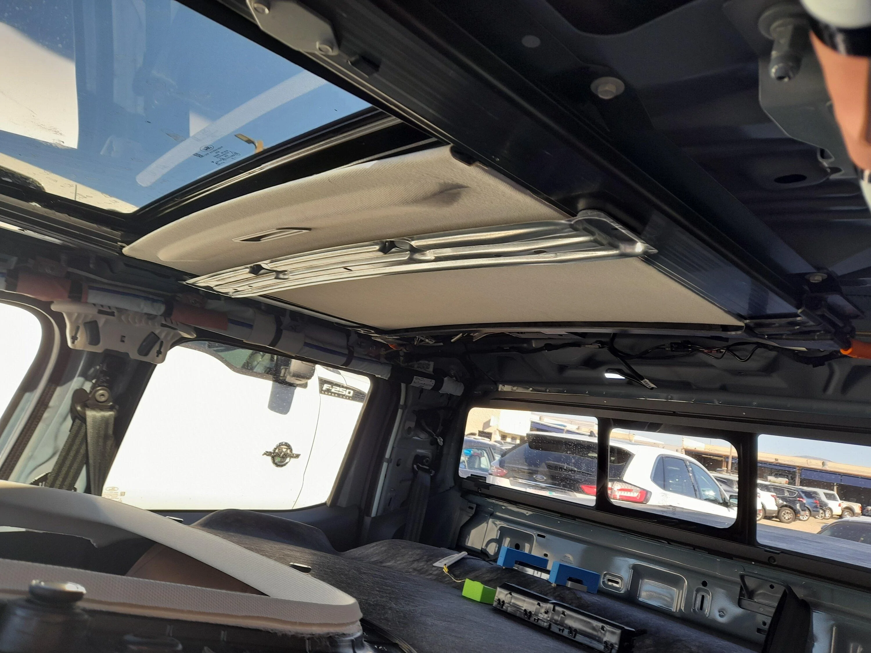 Ford Maverick MAV has custom shower... rain water leak @ map lights and sunroof switch 20230208_144633