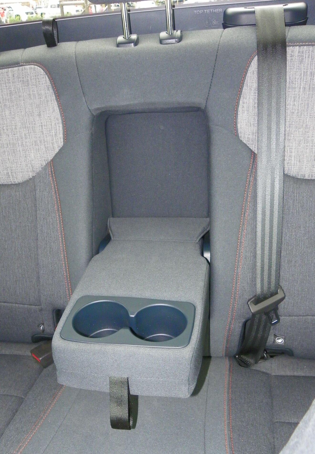 Ford Maverick TX State Fair Auto Show Rear Seat drop down cup holders.JPG