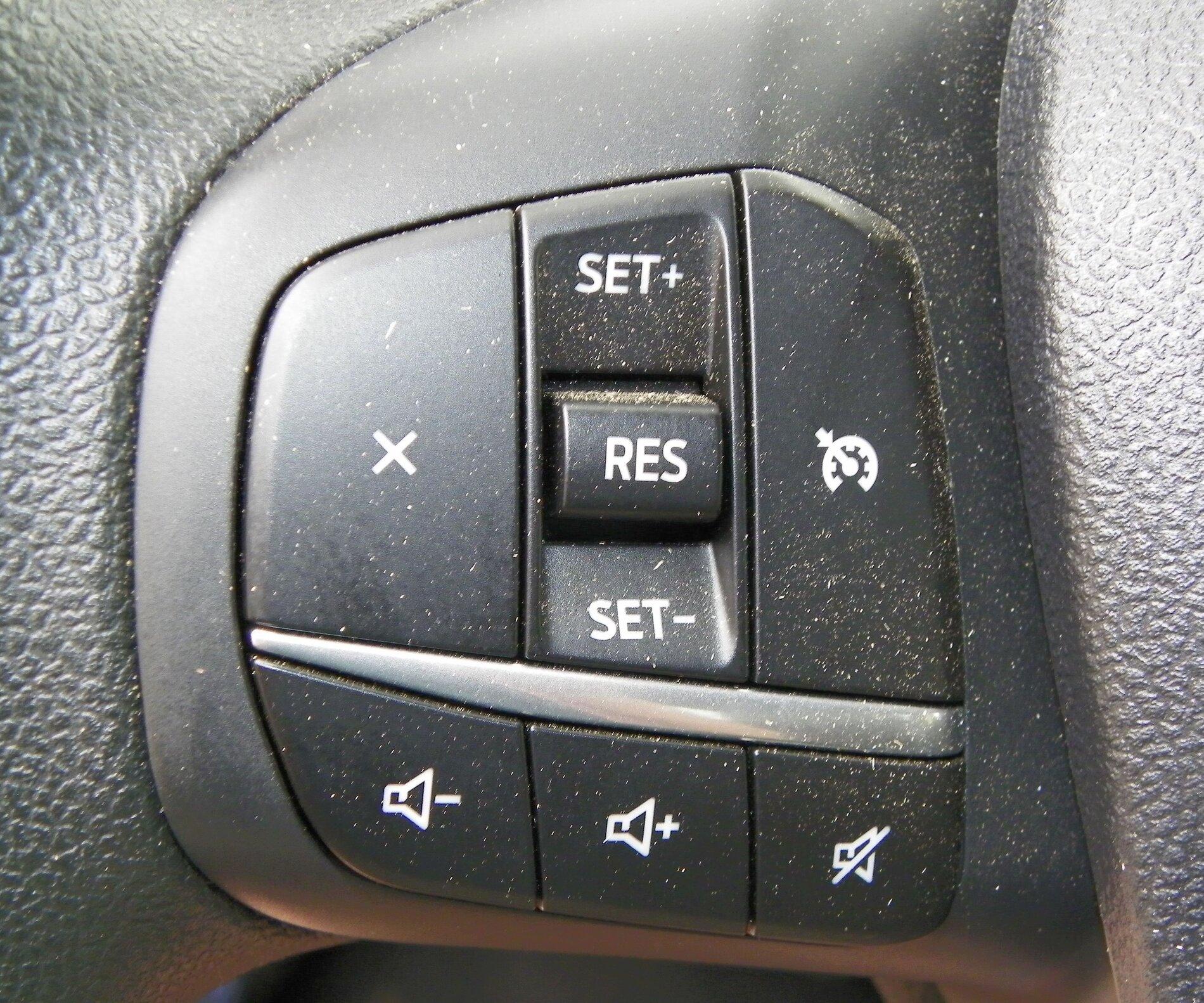 Ford Maverick TX State Fair Auto Show Cruise Control Buttons on Left Side of Steering Wheel.JPG