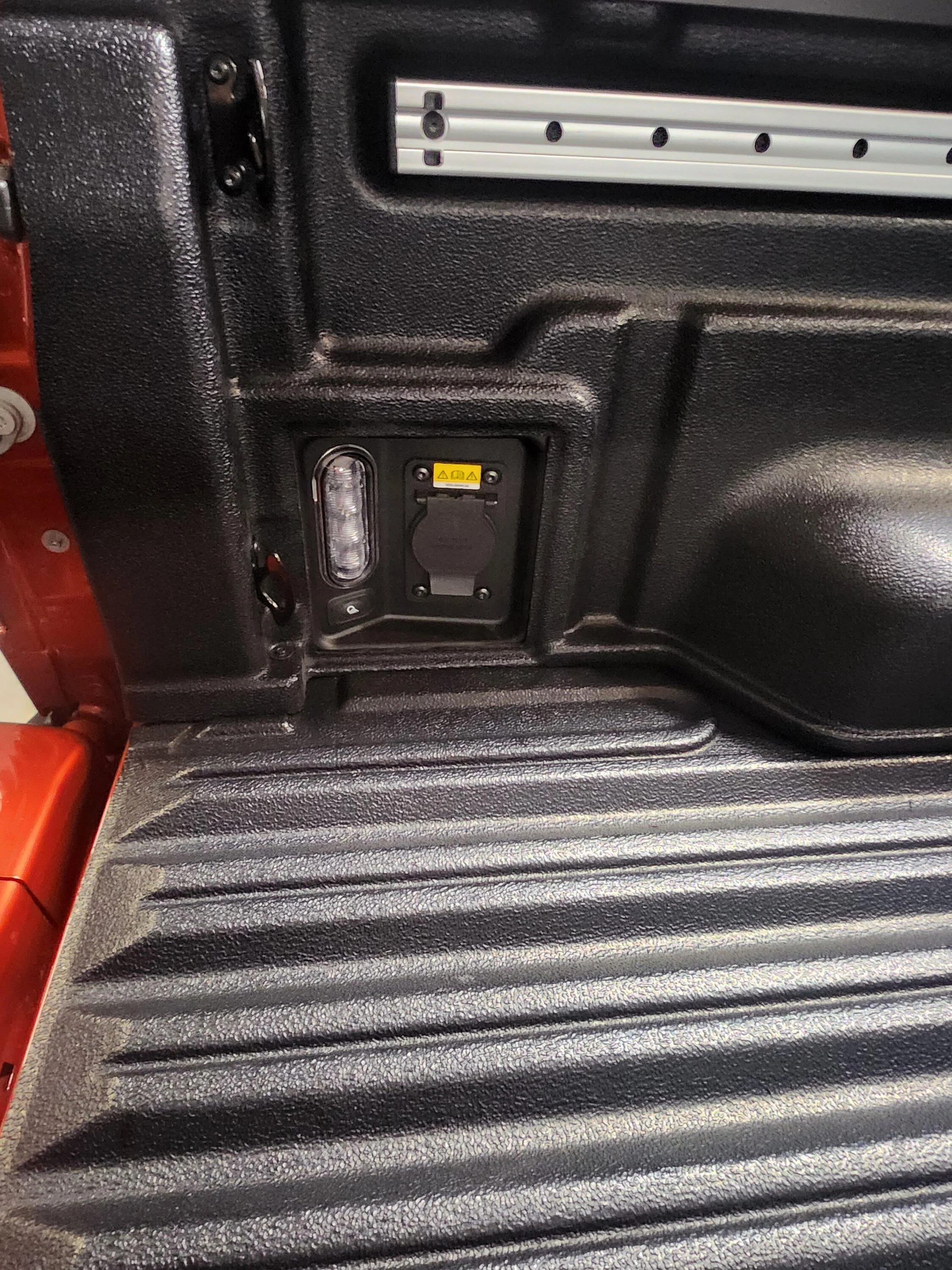 Ford Maverick Drop-in Bedliner cutouts mount behind access panels? 20230311_174051