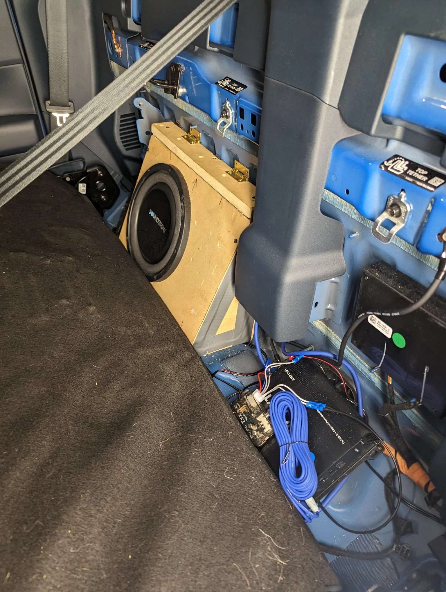 Ford Maverick Rear speaker wires for sub install -- use this location to tap into the left and right speakers IMG_20230313_195506
