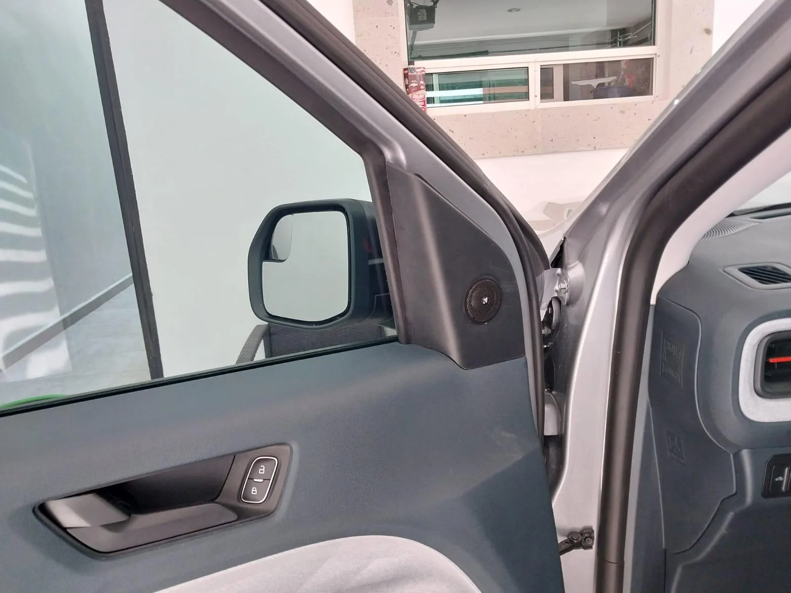 Ford Maverick Rear speaker wires for sub install -- use this location to tap into the left and right speakers tweeter1