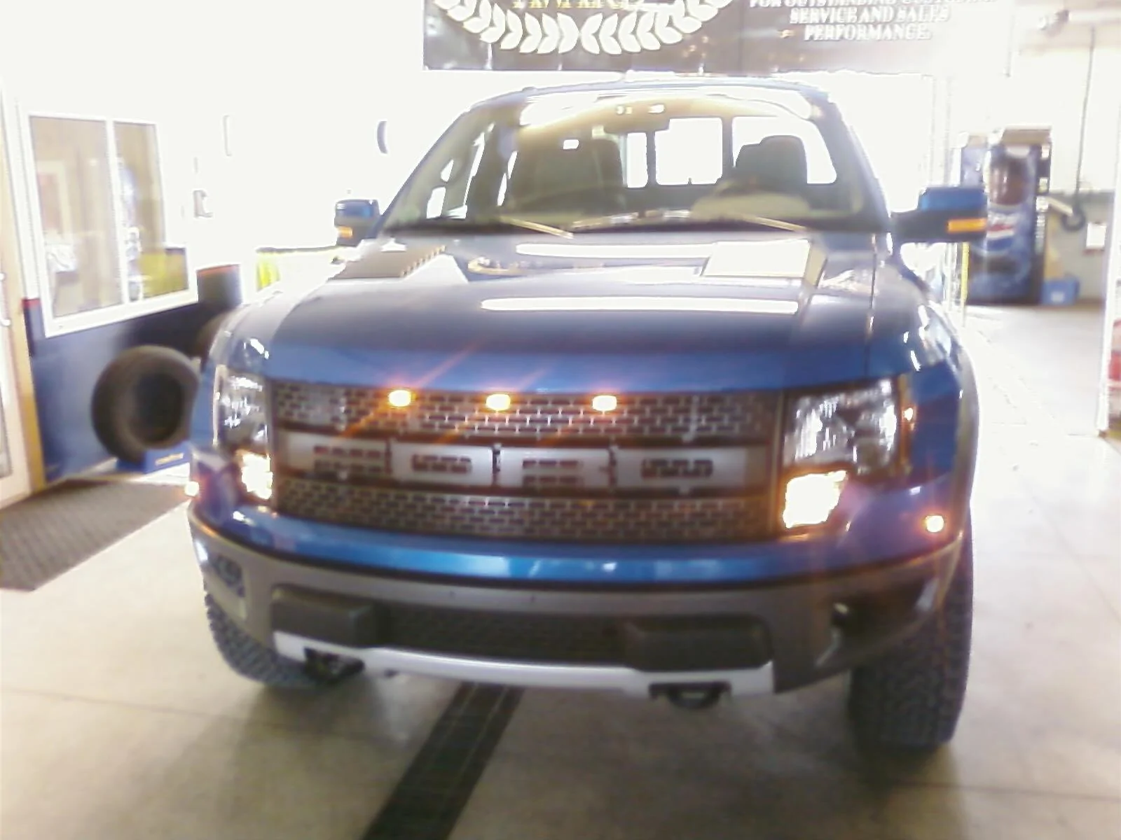 Ford Maverick Raptor style LED amber lights installed in hood deflector Cliff-0054