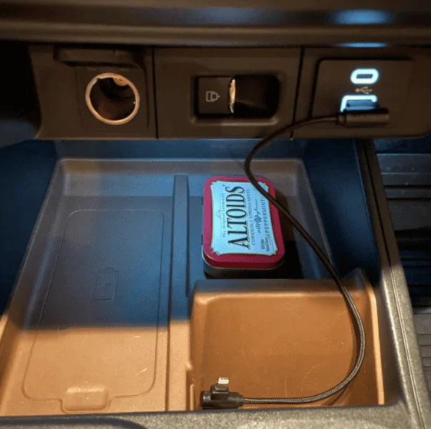 Ford Maverick Impractical phone holder cord slot? 1679902228115