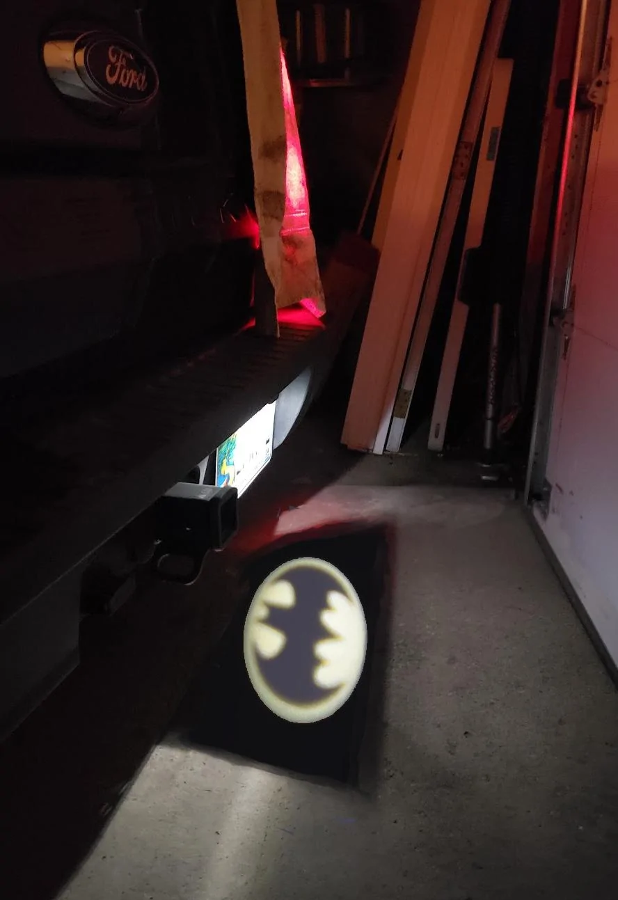 Ford Maverick Does this kinda bug anybody else? bat signal license plate light