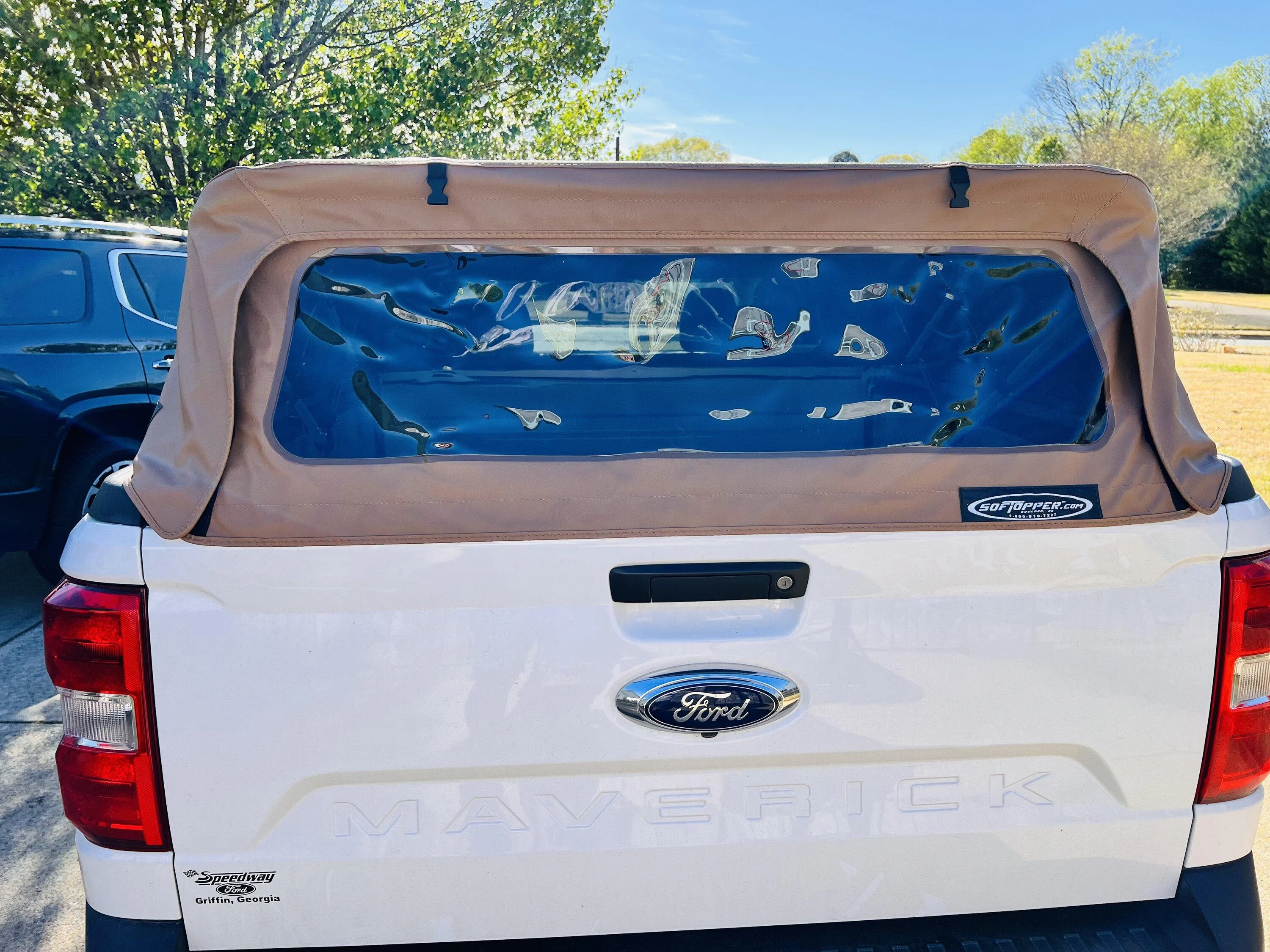 Ford Maverick Tan SofTopper installed on White XL 4B113306-A288-4B03-A10E-6AE44C6601F4