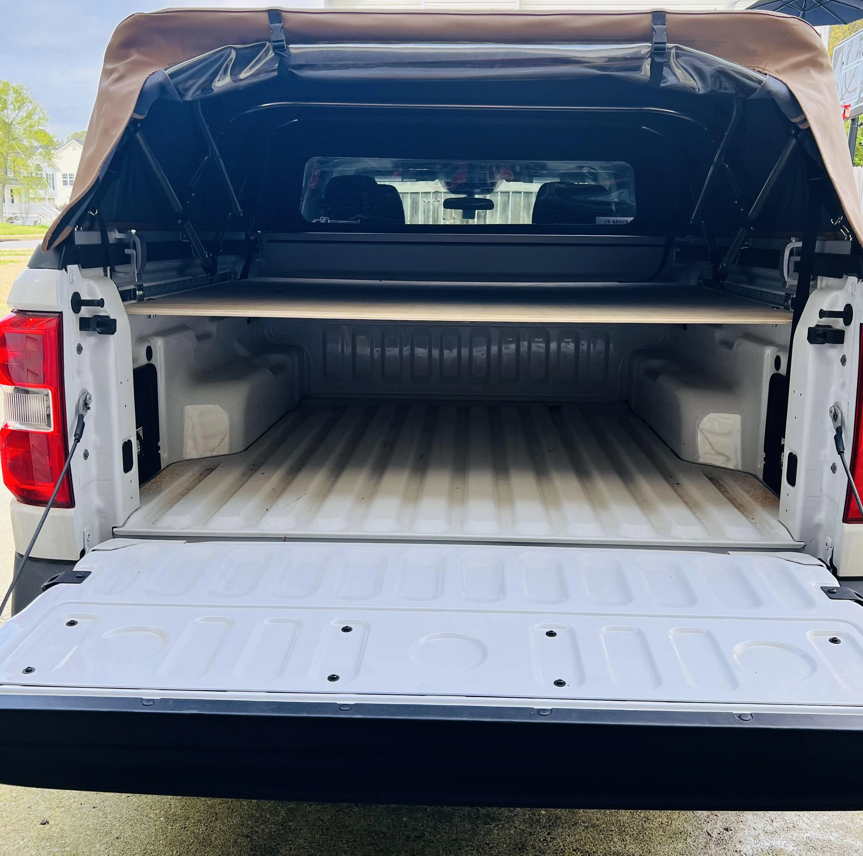 Ford Maverick Tan SofTopper installed on White XL AE0879C3-FA38-497C-82E2-DE1E2038F201