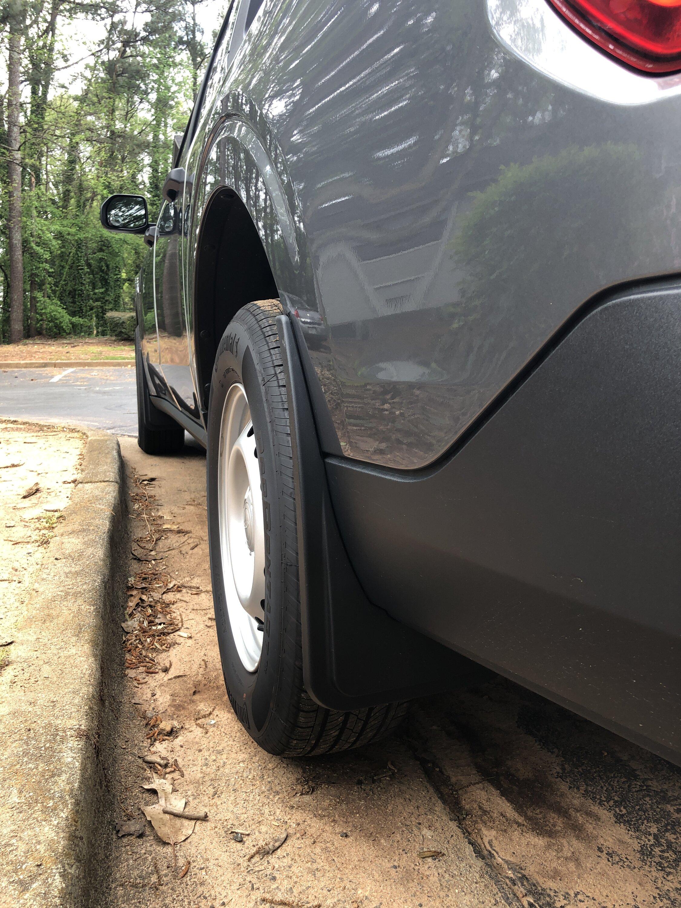Ford Maverick Did Muslogy mud laps and tail gate liners add-on today right mud flap.JPG