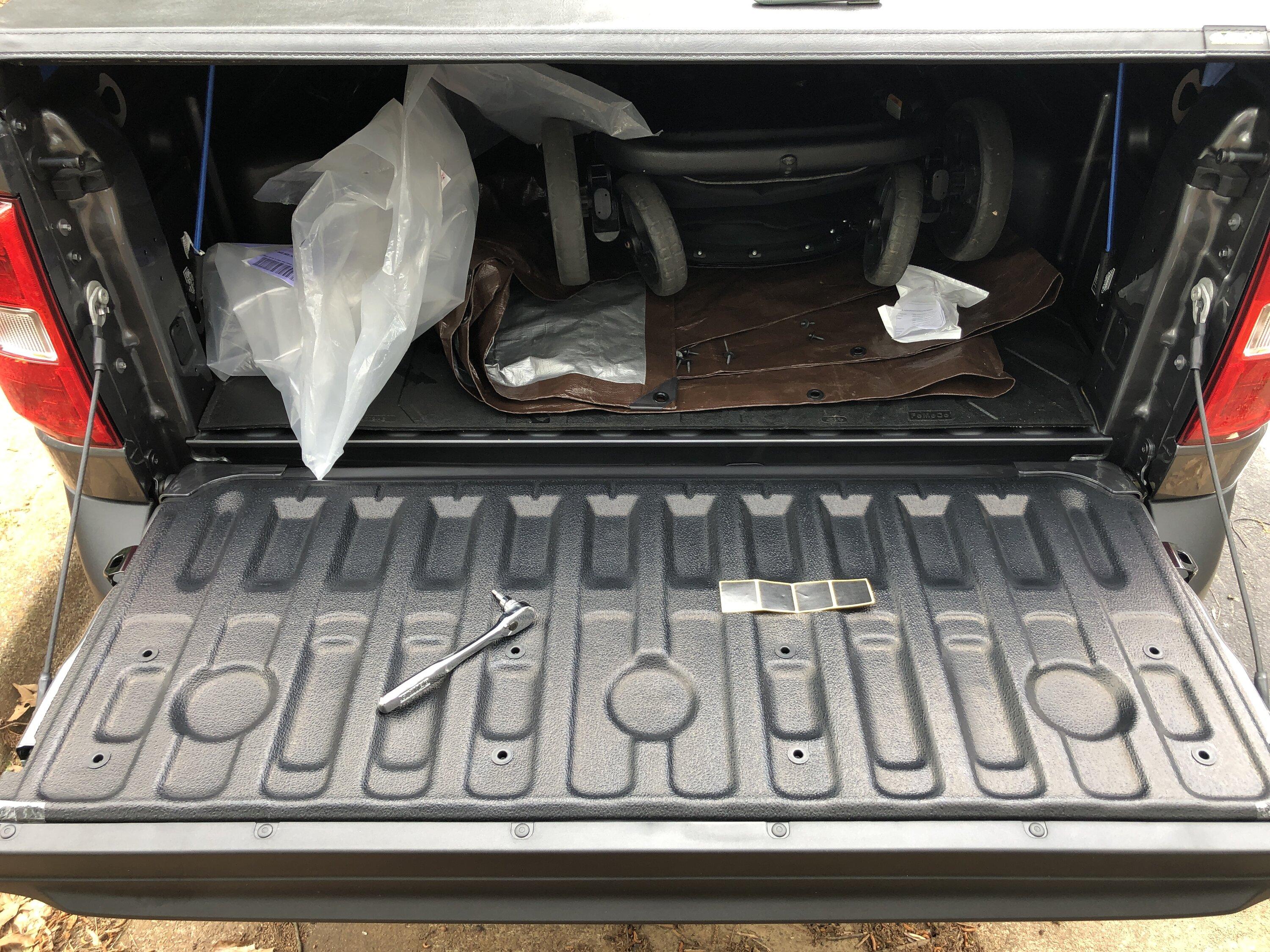 Ford Maverick Did Muslogy mud laps and tail gate liners add-on today tail gate with liner with sticker.JPG