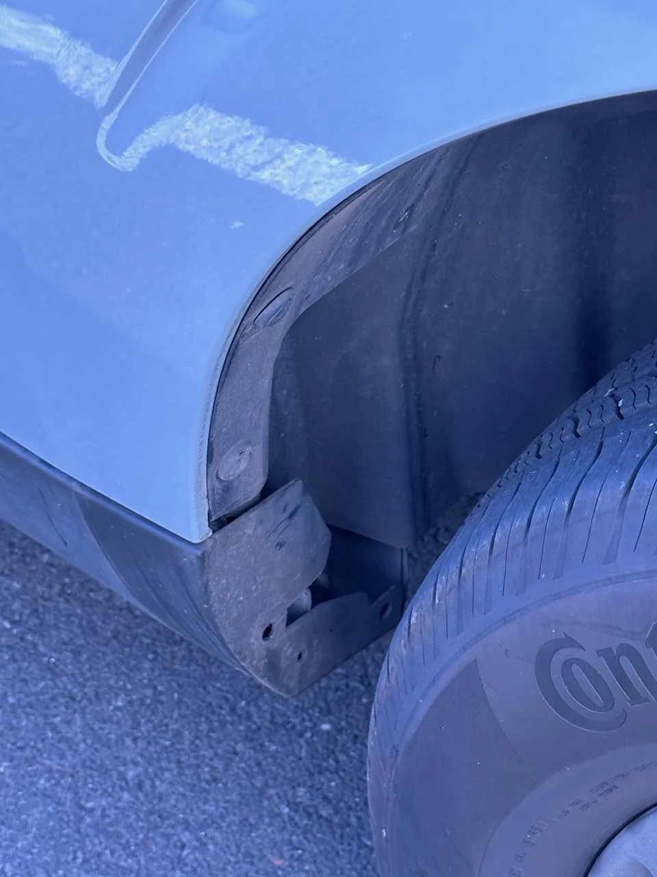 Ford Maverick Part # for rear wheel fender trim/mud guard IMG_0943