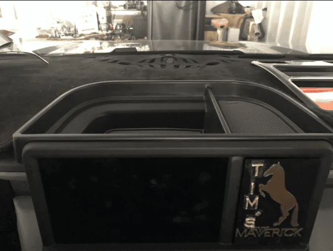 Ford Maverick What additional functionality Muslogy Dash Storage Tray has? 1681269571453