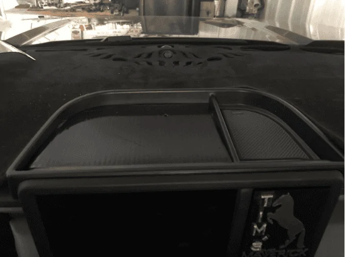 Ford Maverick What additional functionality Muslogy Dash Storage Tray has? 1681269583874