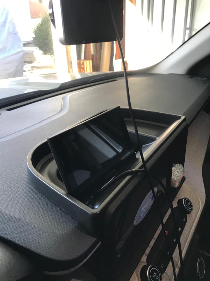 Ford Maverick What additional functionality Muslogy Dash Storage Tray has? 1681269658852