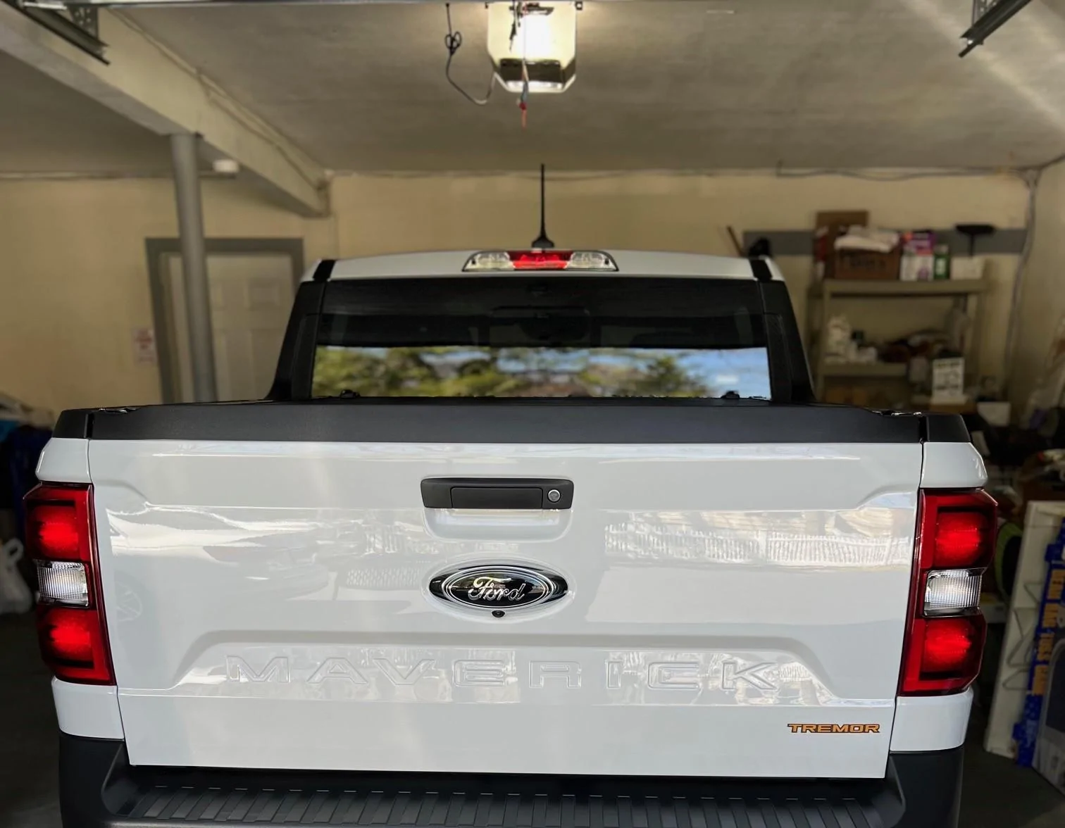 Ford Maverick Tremor orange with black tailgate letters Tailgate letters befor