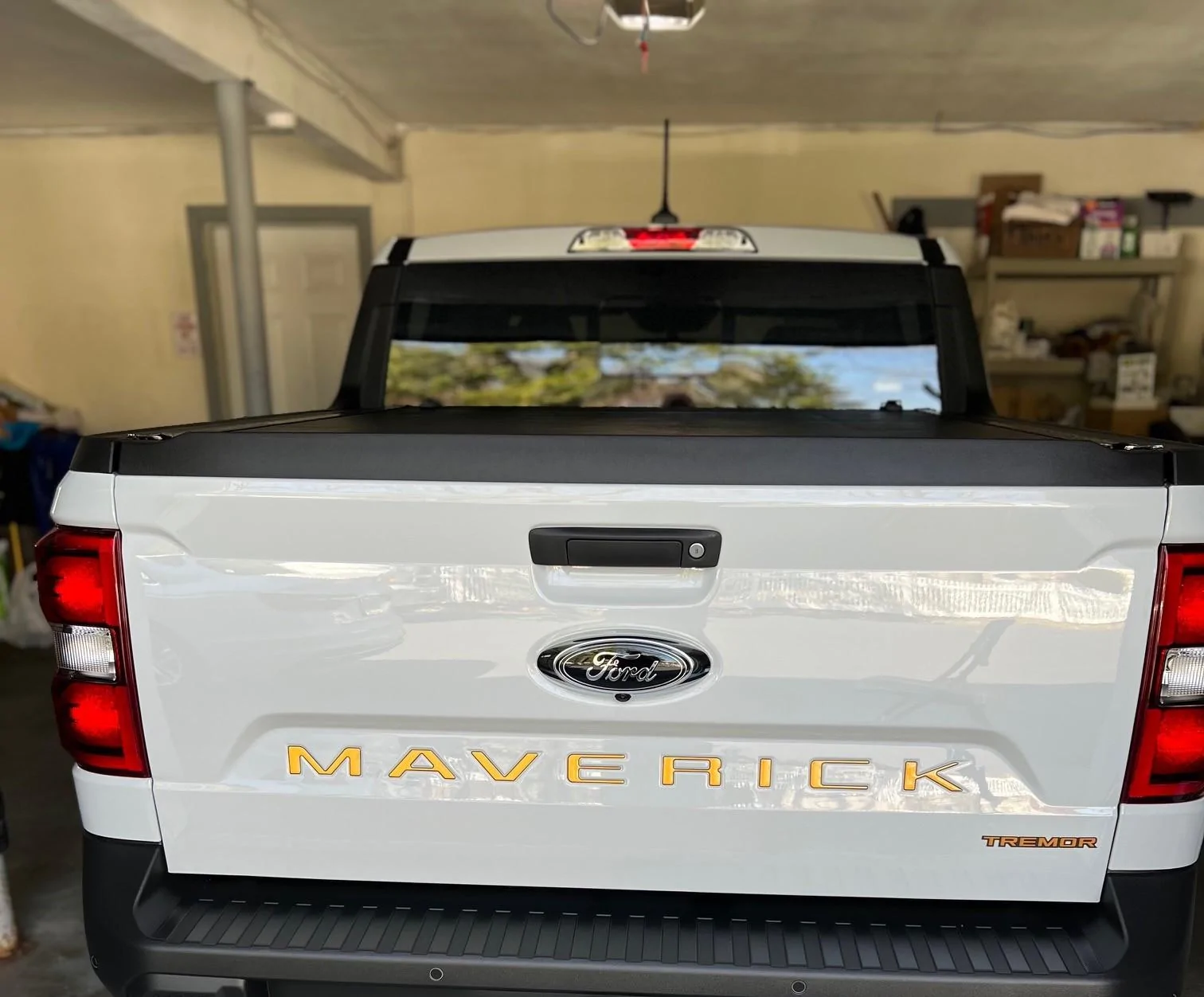 Ford Maverick Tremor orange with black tailgate letters Tailgate letters after