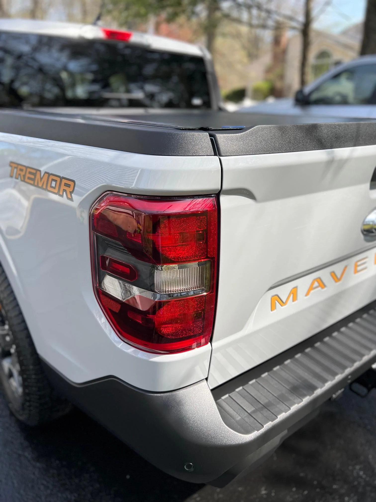 Ford Maverick Tremor orange with black tailgate letters Tailgate Letters Side Vi