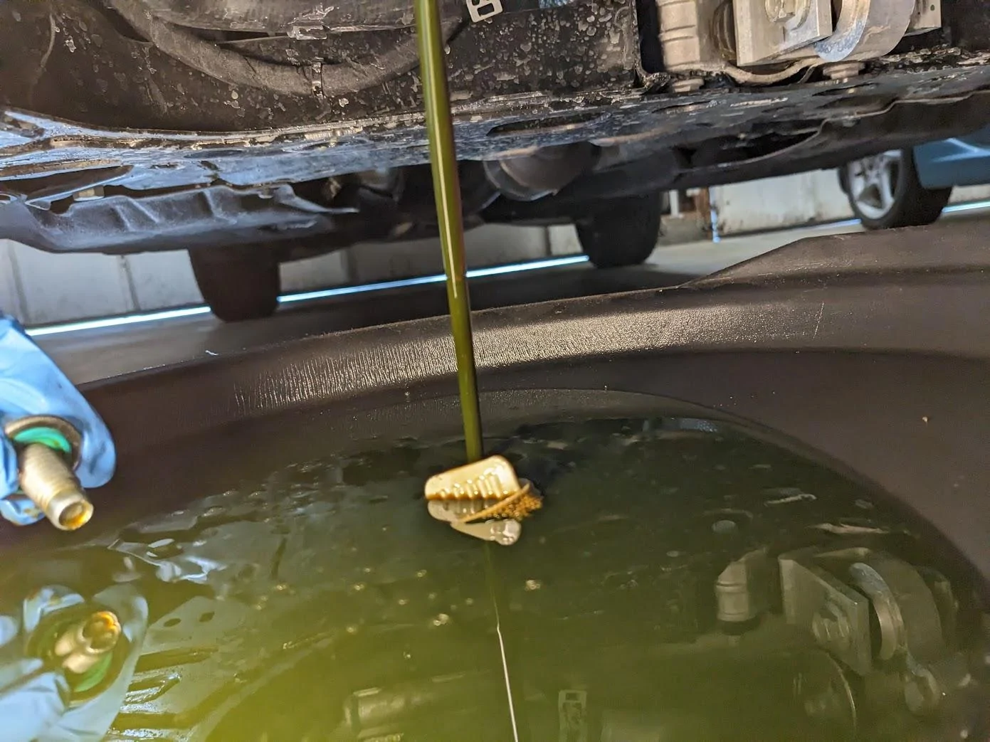Ford Maverick How To: Oil Change on Tremor Maverick green oil