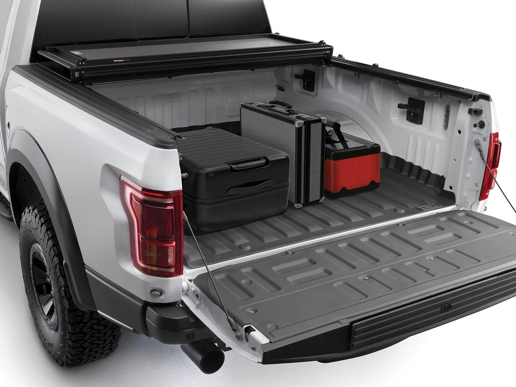 Ford Maverick Weathertech aluminum bed cover installed Alloy_CoverRaptor_Luggage1